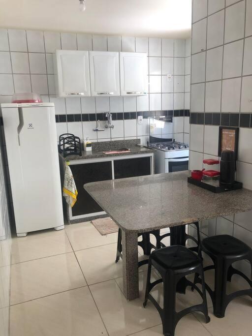 Apartamento Completo - 2 Quartos na Praia do Morro e Garagem - WiFi Fibra