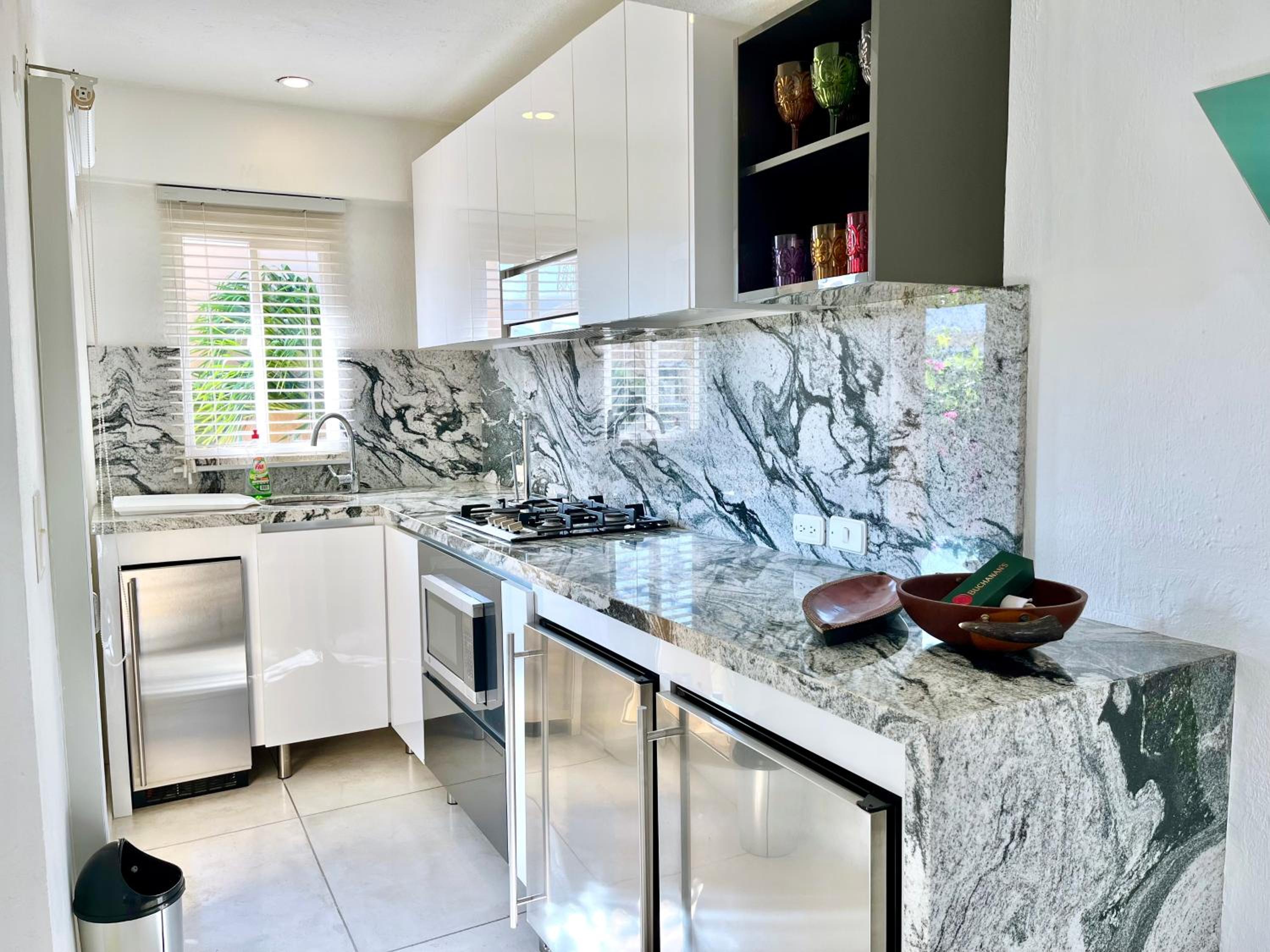 by Calamari Homes - Parque Centenario casa 206 walled city