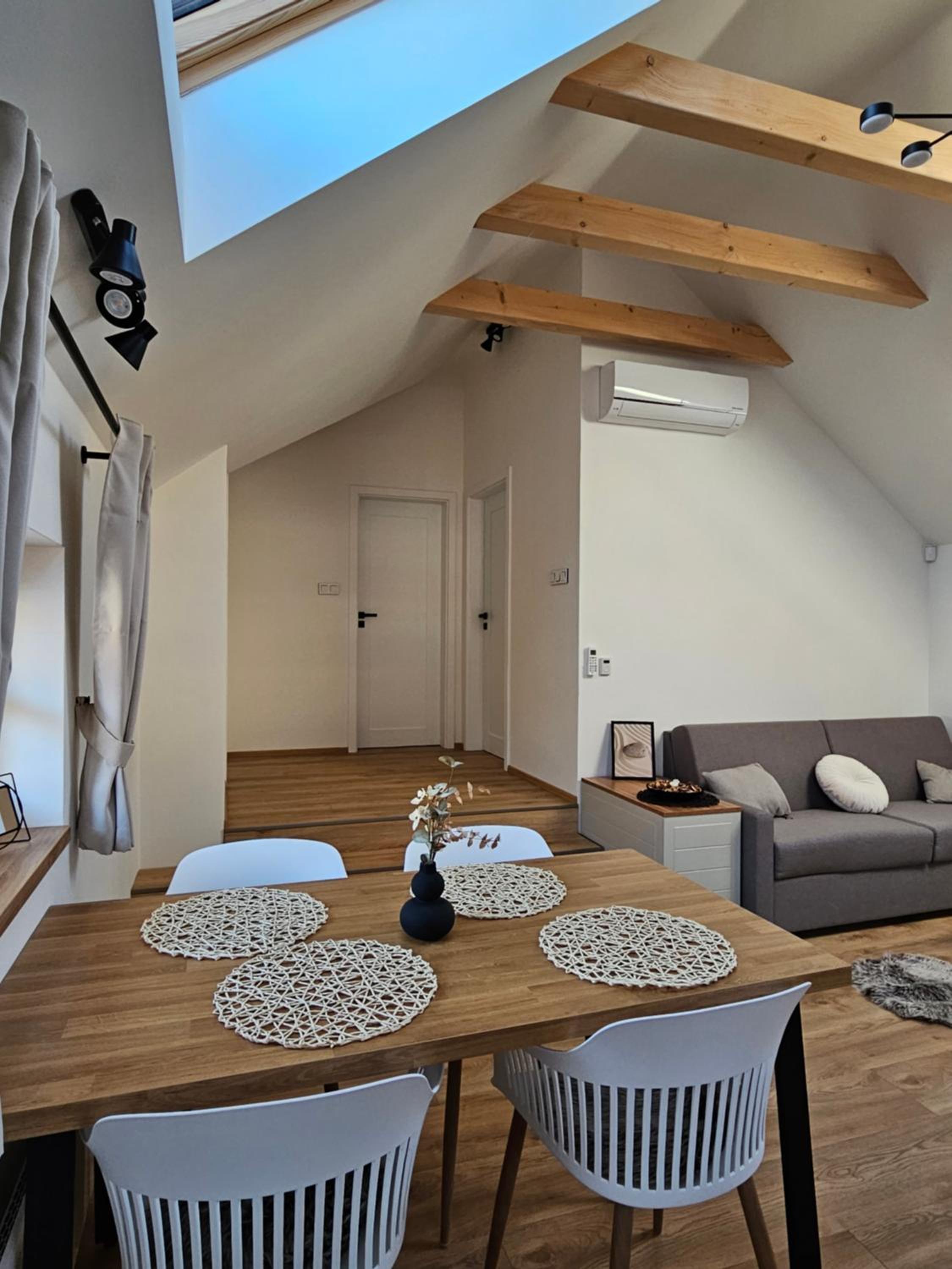 Pod vinohradem - apartmány & vinné sklepy