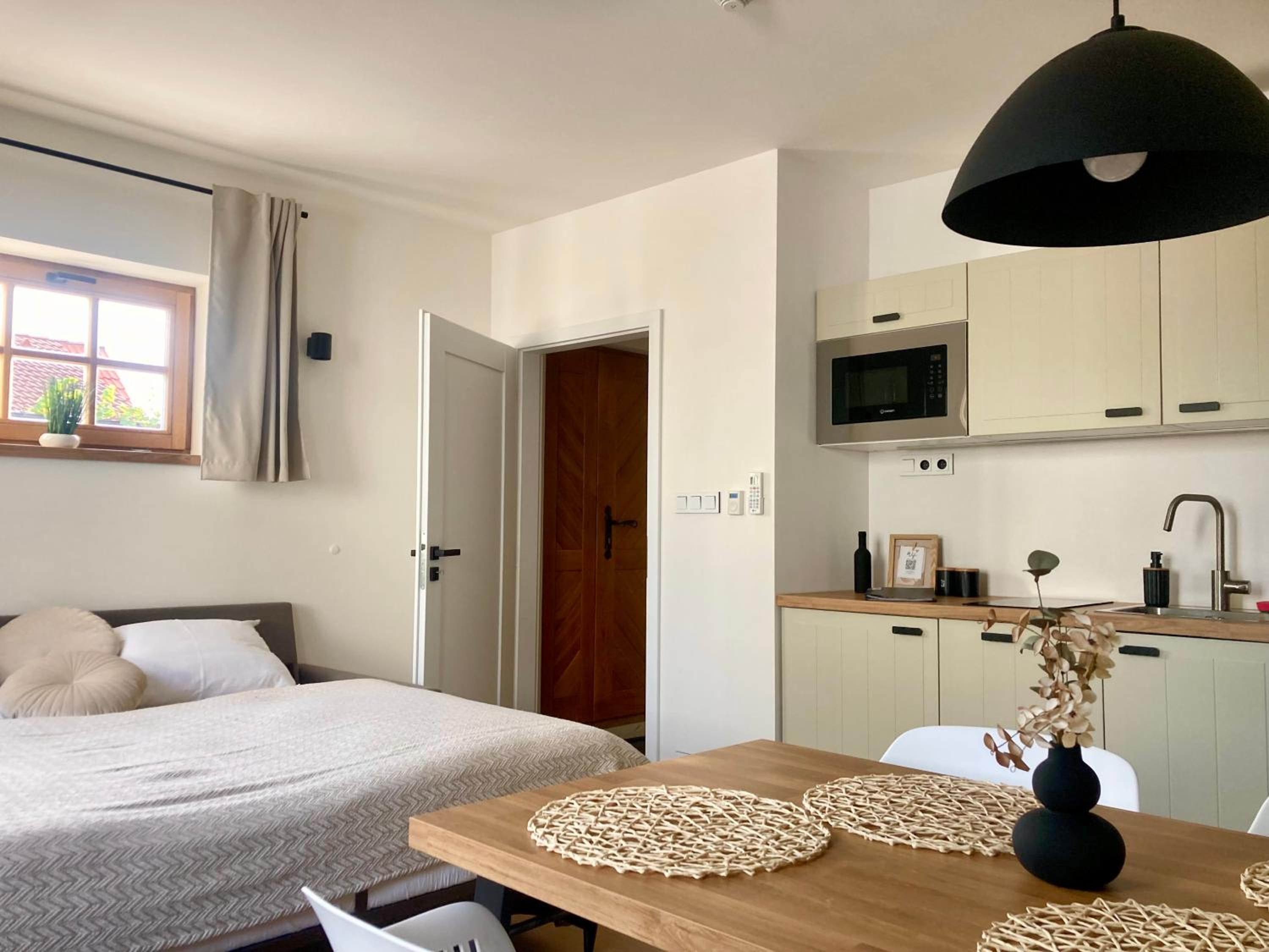 Pod vinohradem - apartmány & vinné sklepy