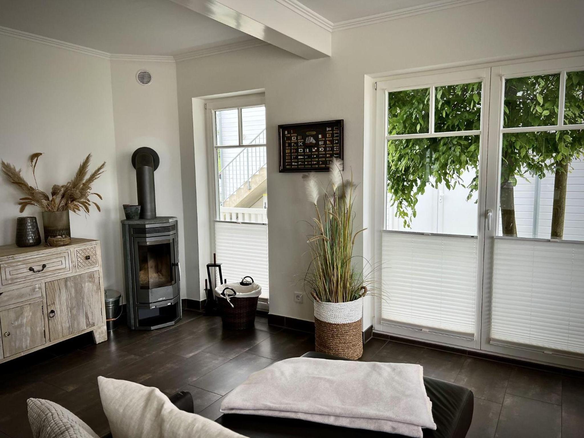 Ferienhaus-Sliminde-by-Seeblick-Ferien-direkte-Wasserlage-E-Ladesaeule-Sauna