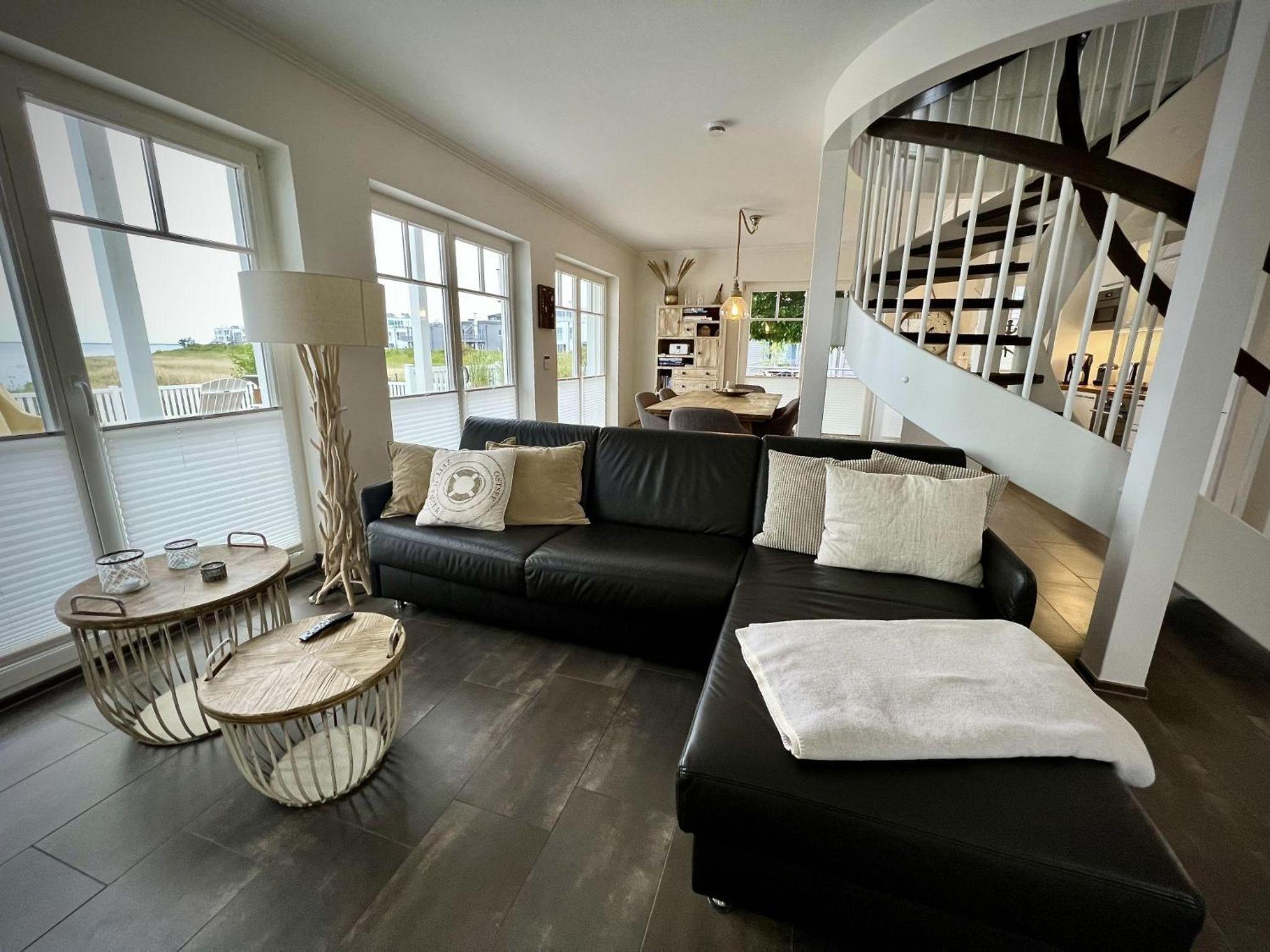 Ferienhaus-Sliminde-by-Seeblick-Ferien-direkte-Wasserlage-E-Ladesaeule-Sauna