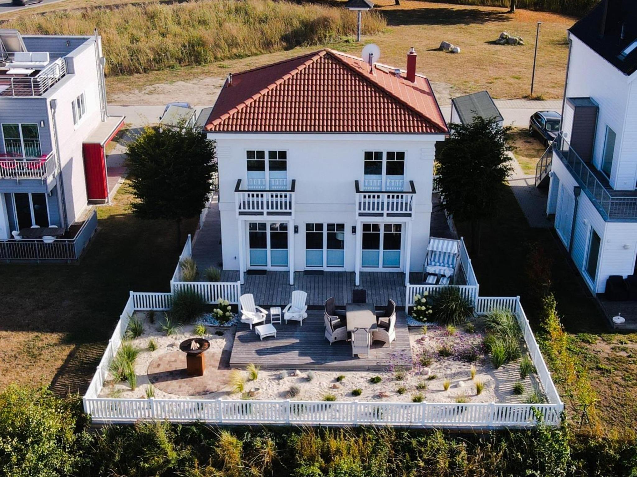 Ferienhaus-Sliminde-by-Seeblick-Ferien-direkte-Wasserlage-E-Ladesaeule-Sauna