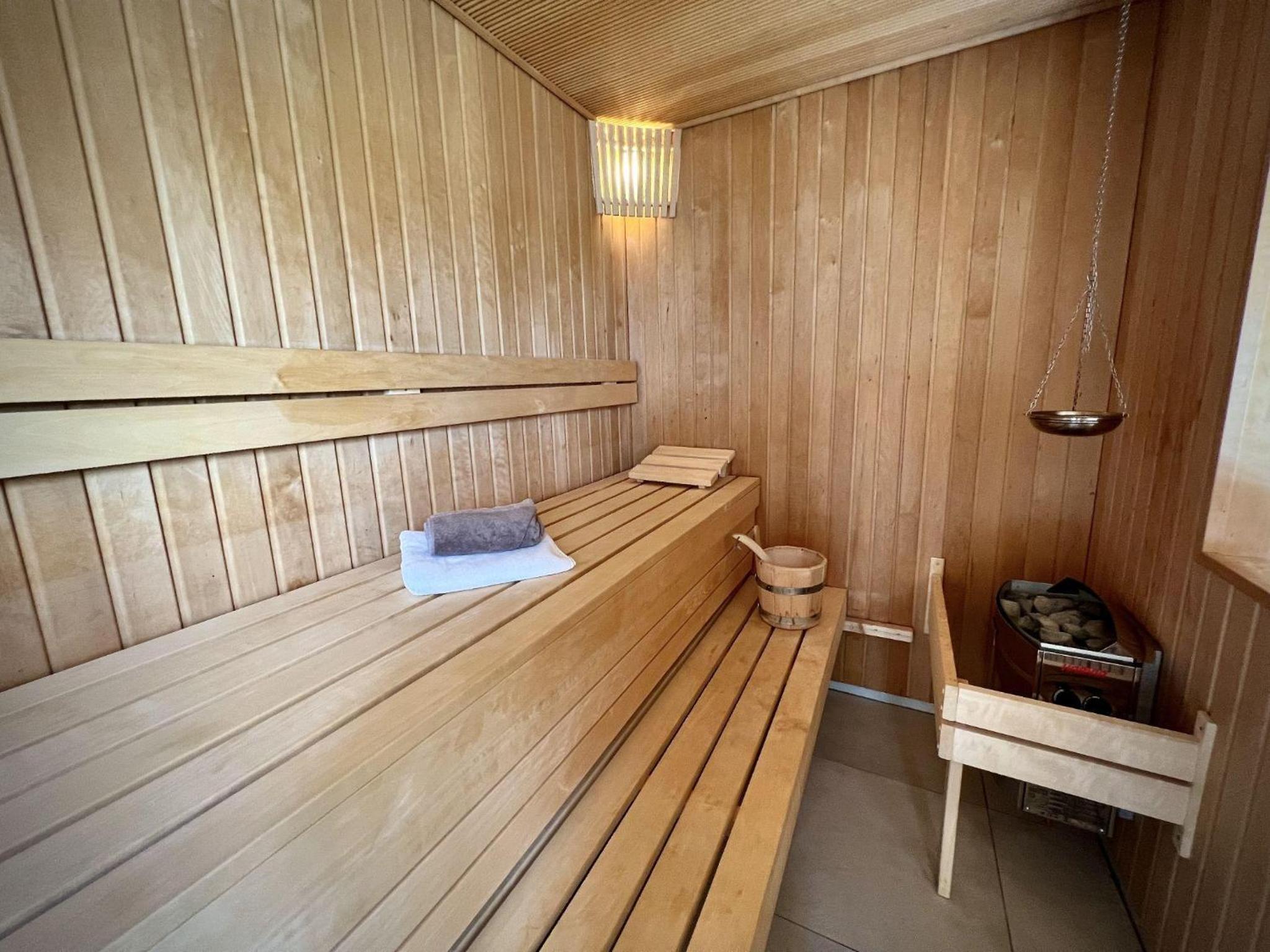 Ferienhaus-Sliminde-by-Seeblick-Ferien-direkte-Wasserlage-E-Ladesaeule-Sauna