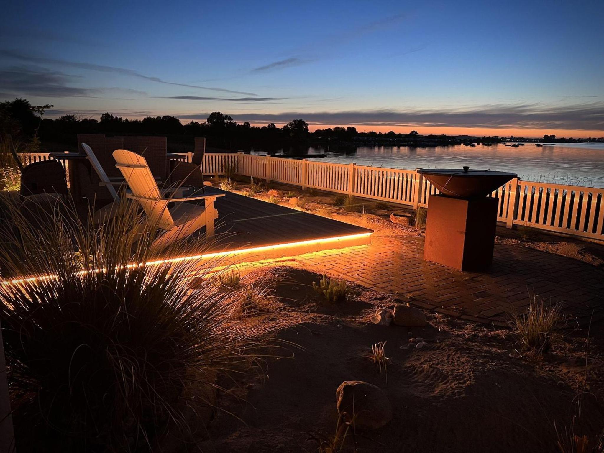 Ferienhaus-Sliminde-by-Seeblick-Ferien-direkte-Wasserlage-E-Ladesaeule-Sauna