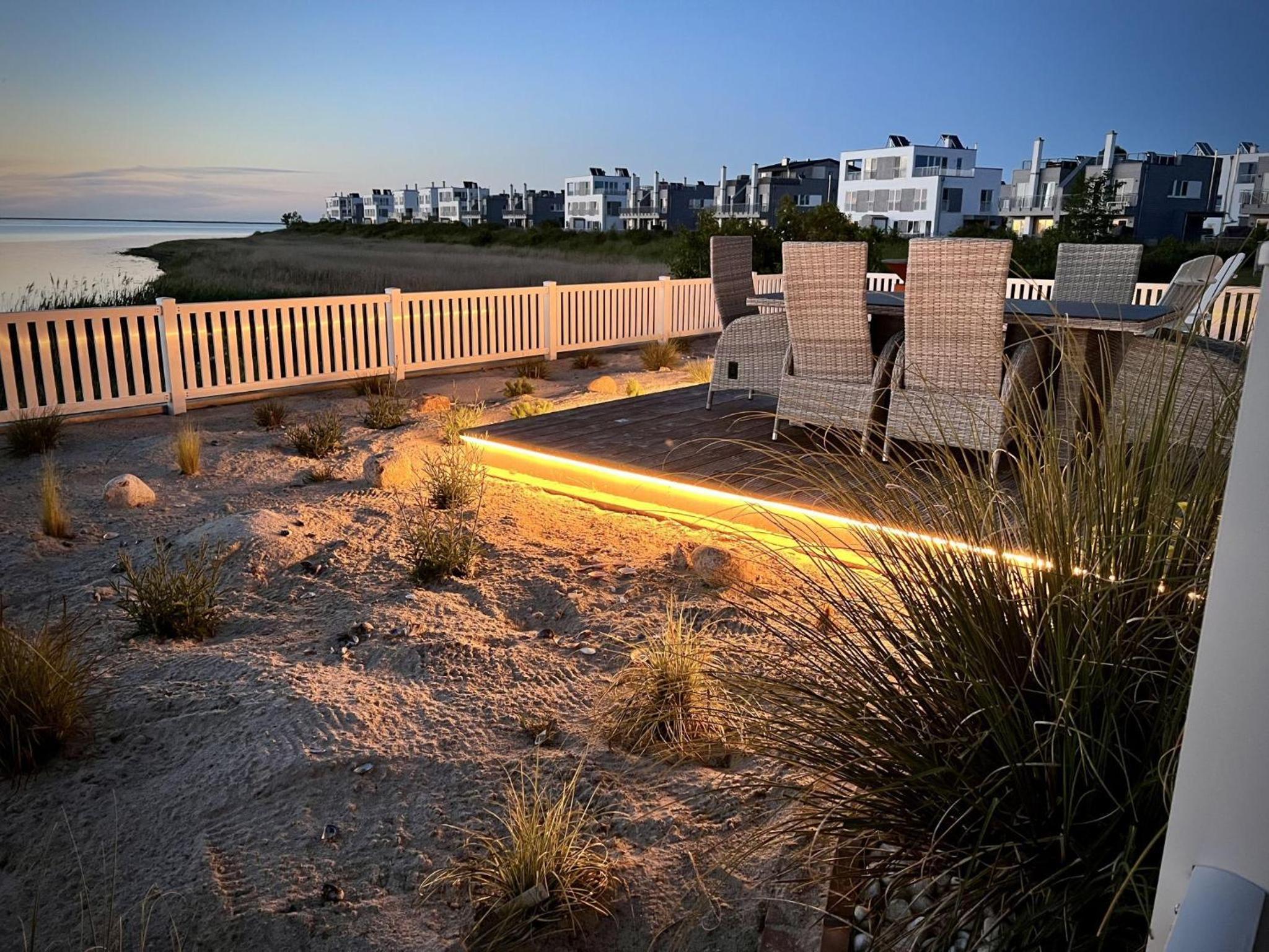 Ferienhaus-Sliminde-by-Seeblick-Ferien-direkte-Wasserlage-E-Ladesaeule-Sauna