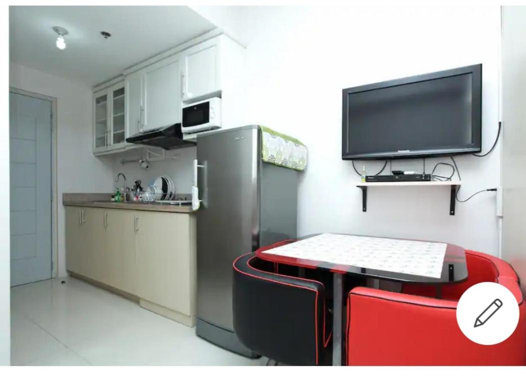 Grass residences furnished condo besides big shopping Mall view 2