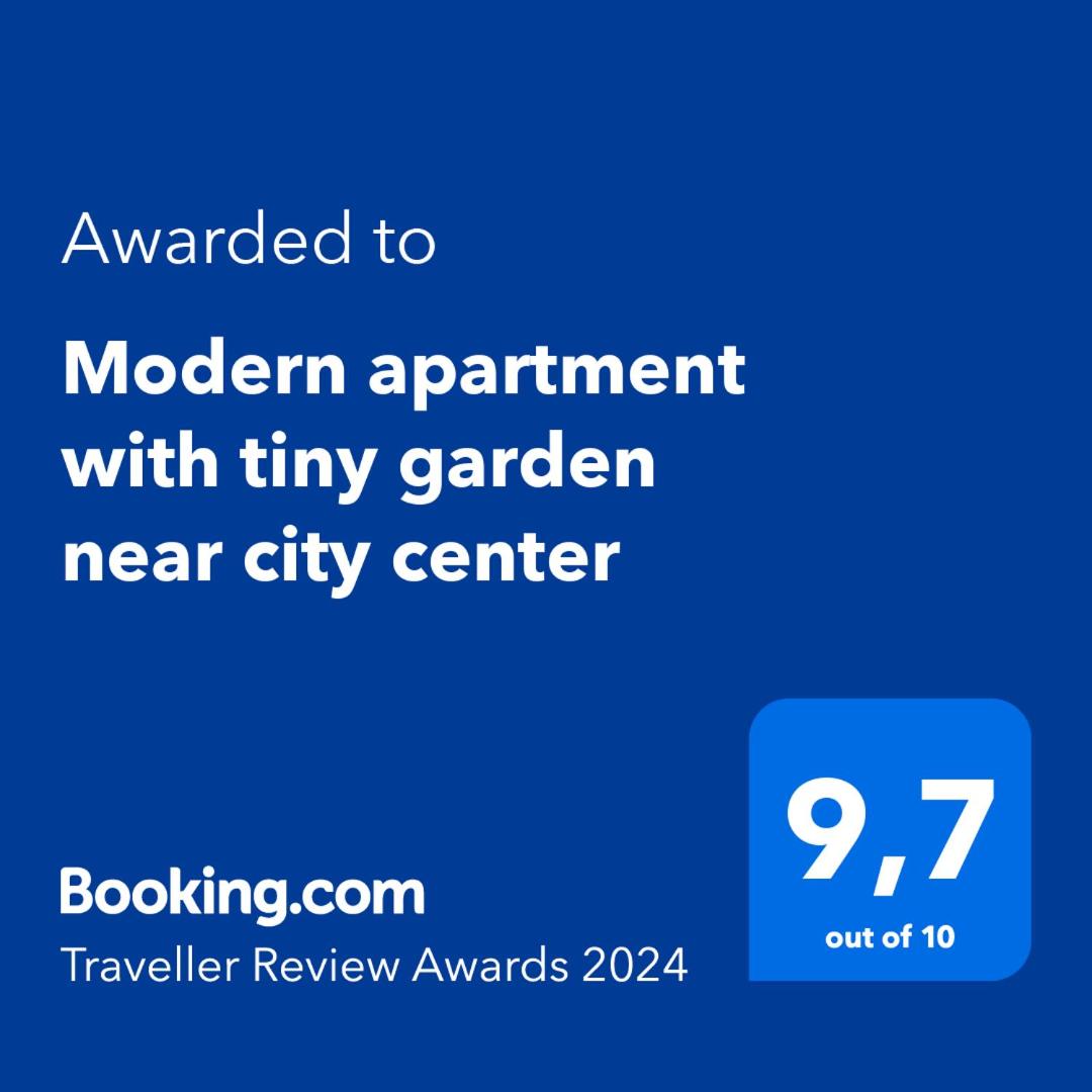 Modern apartment with tiny garden near city center