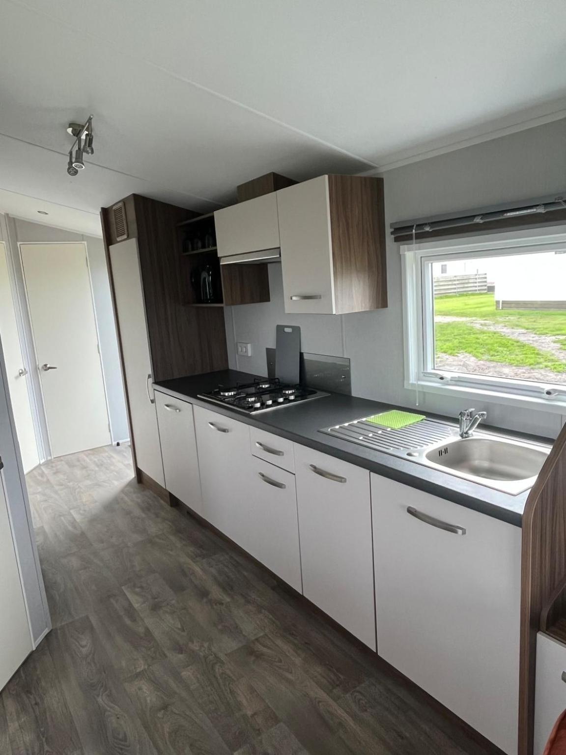 Neues Ferienhaus Chalet Nr73 zweite Reihe direkt am Wattenmeer, komplett eingezäunt