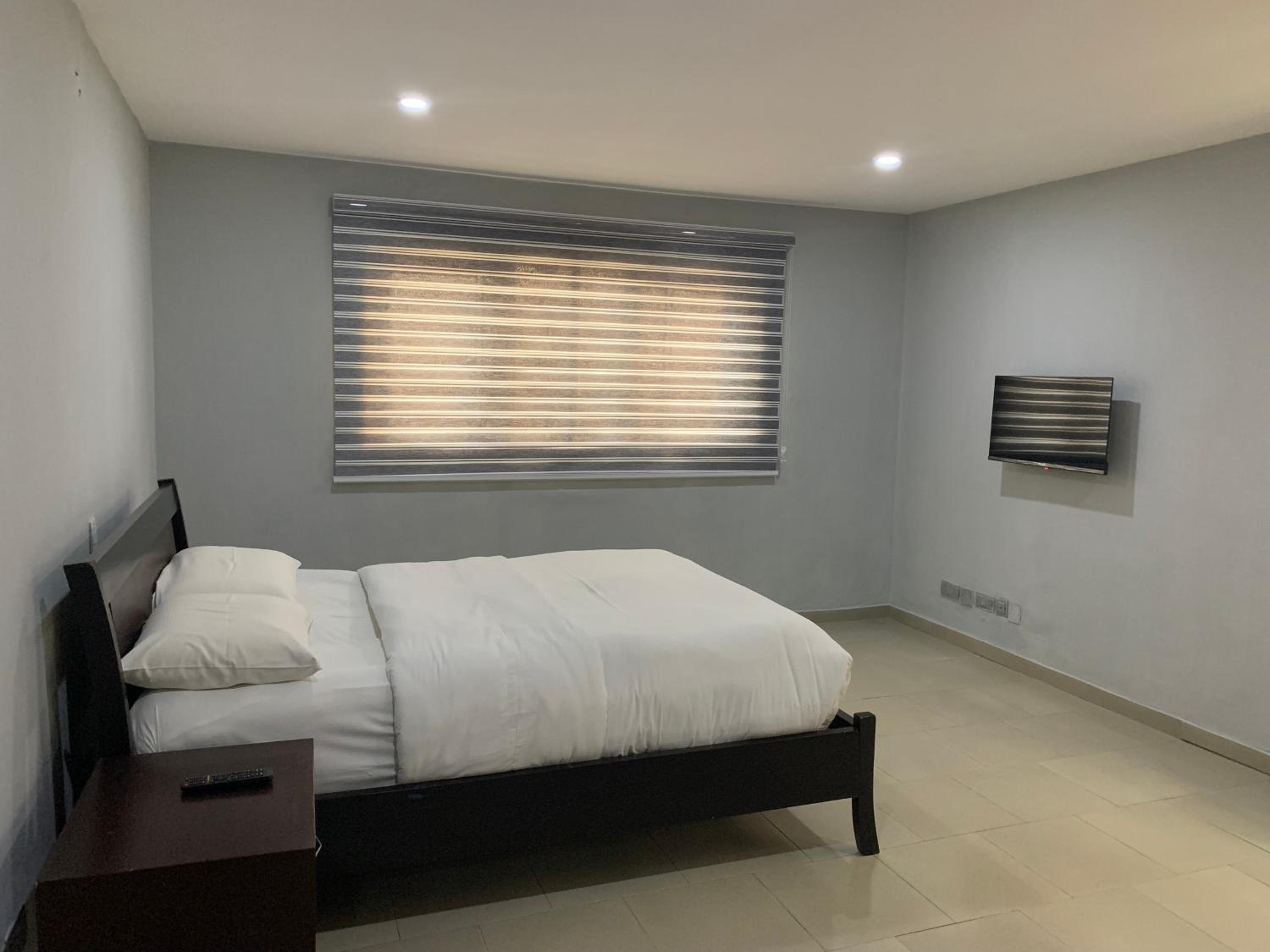 Emem Court - The Emem Apartment Collections