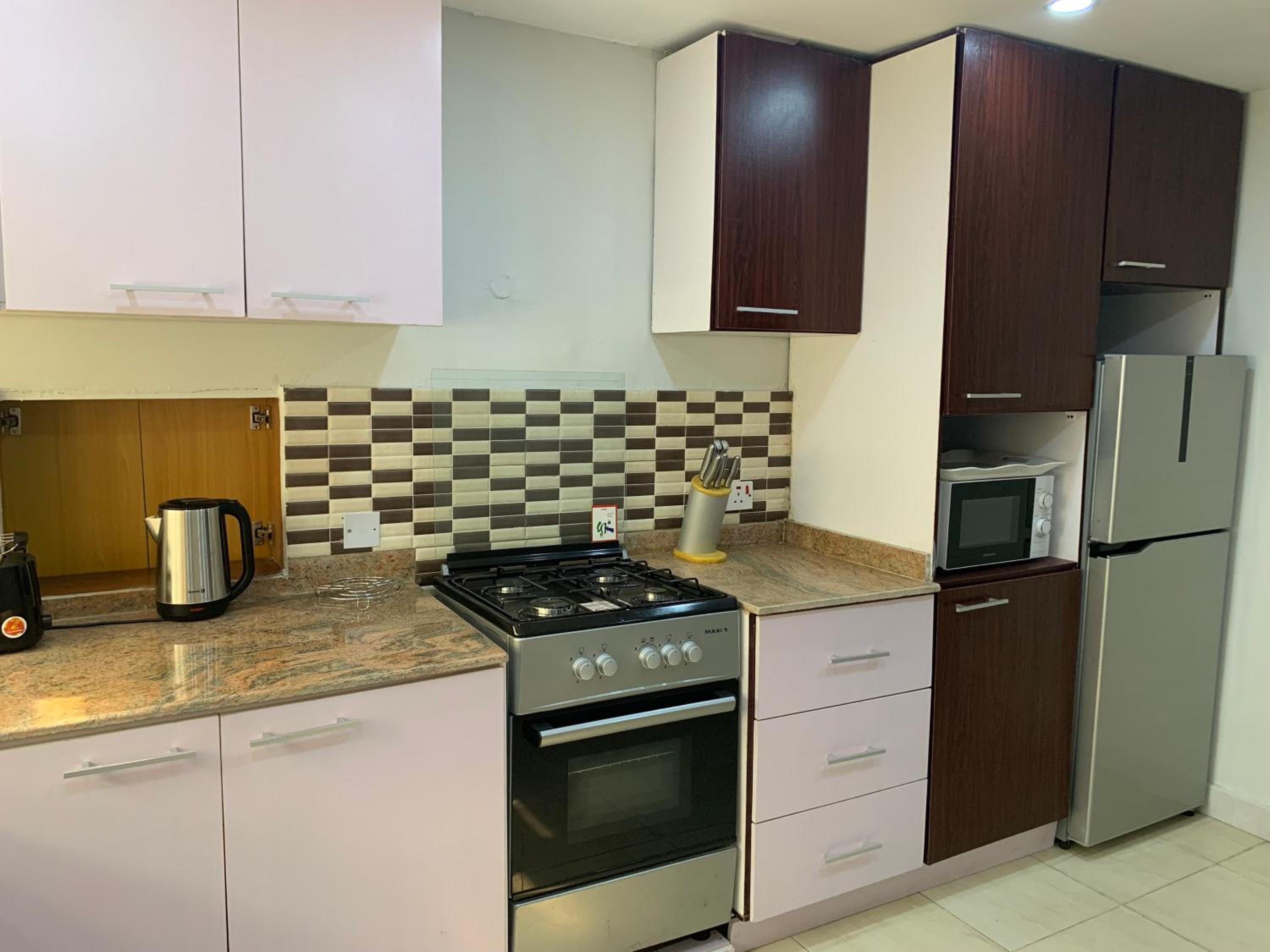 Emem Court - The Emem Apartment Collections