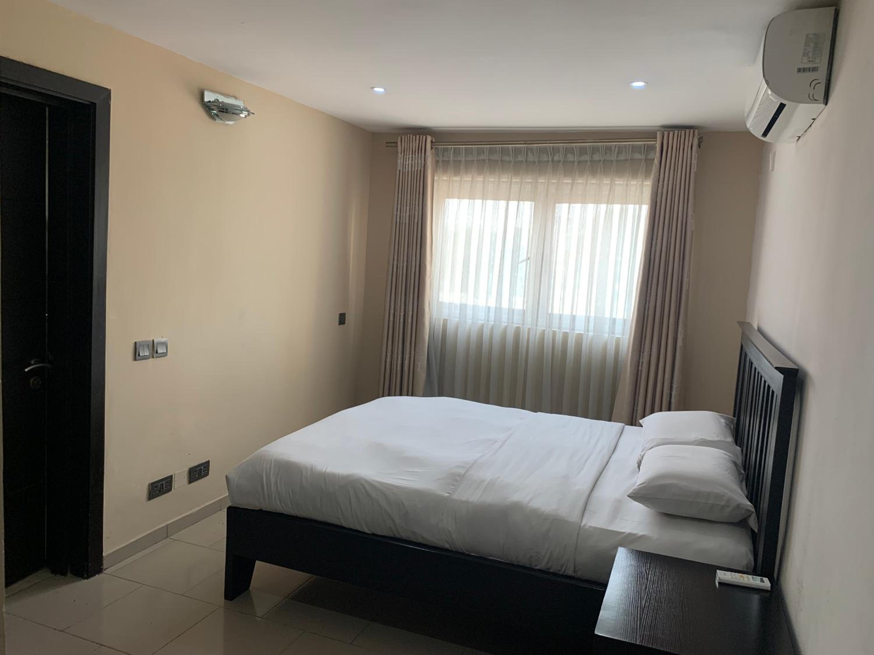 Emem Court - The Emem Apartment Collections