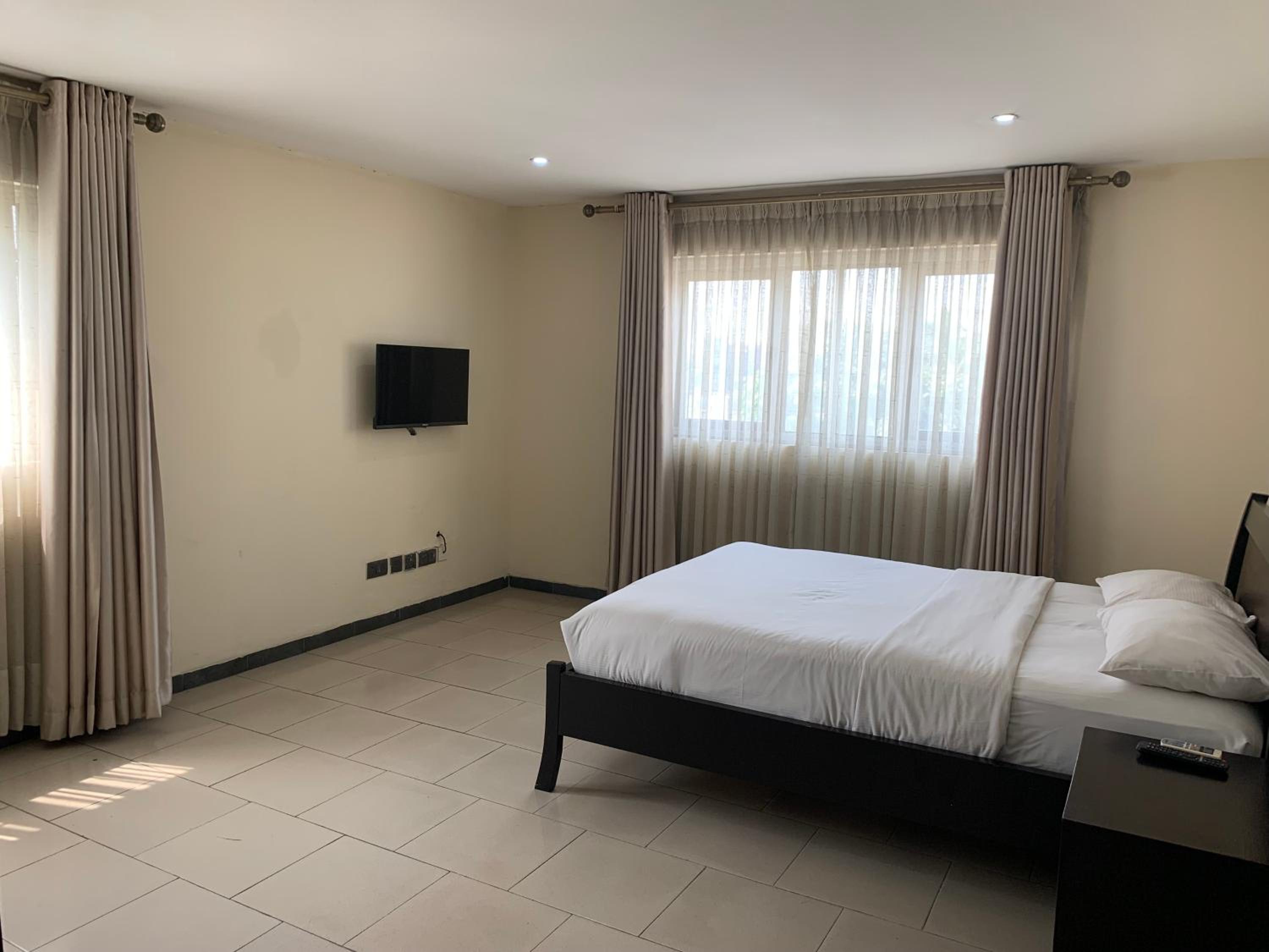 Emem Court - The Emem Apartment Collections
