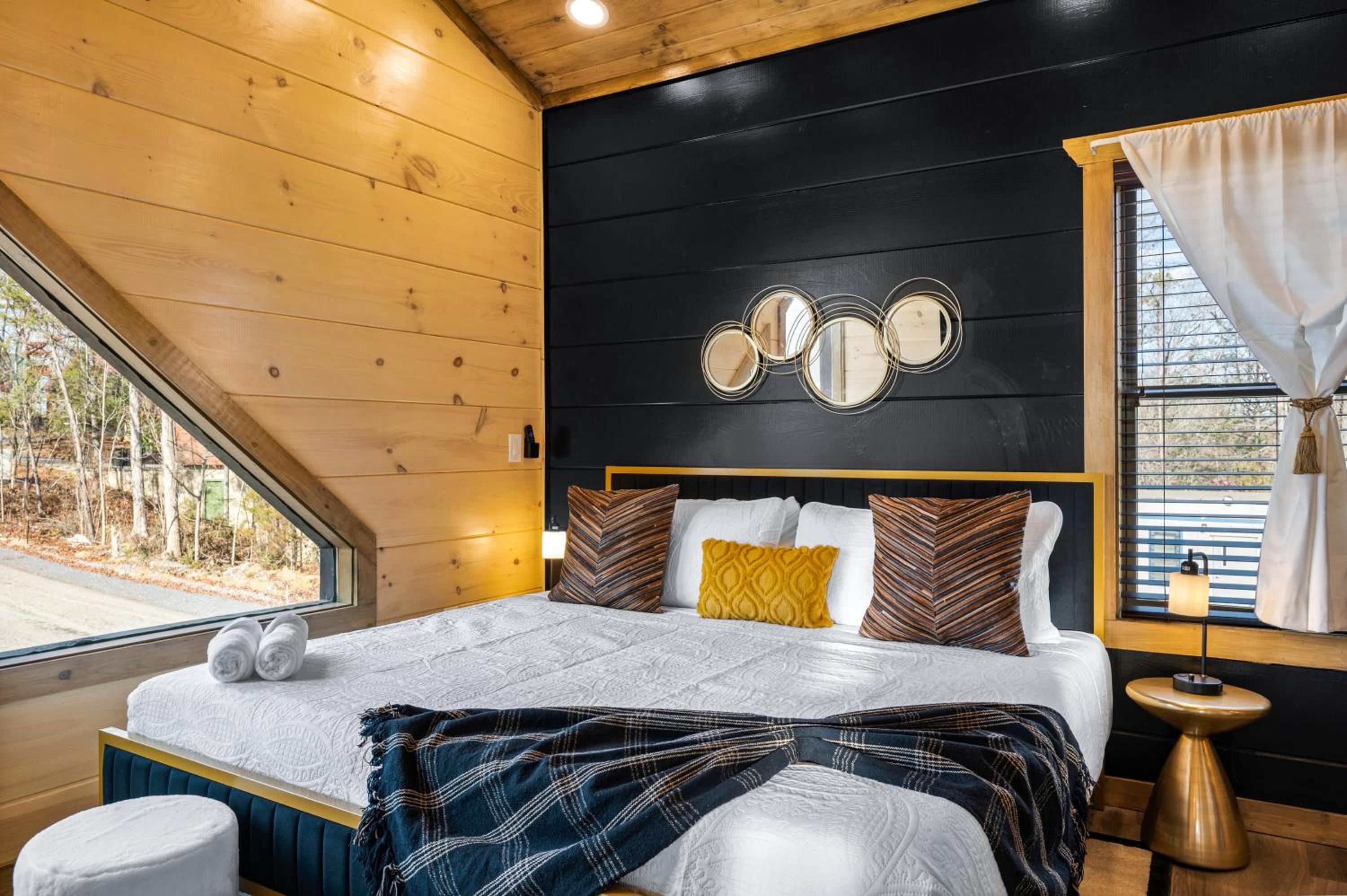 SmokiesBoutiqueCabins would love to host you at our NEW cabin! 3 King Suites, Indoor Pool, Game Room, Lounge with 75" TV! Close to Dollywood and the Parkwa view 5