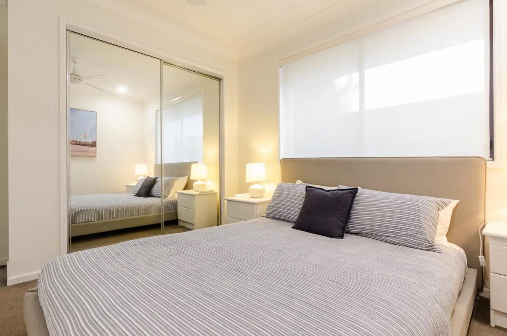 Reflections Broadbeach- Heated Pool! Complete Waterfront Entertainer with Huge Deck, Pool Table and Pontoon