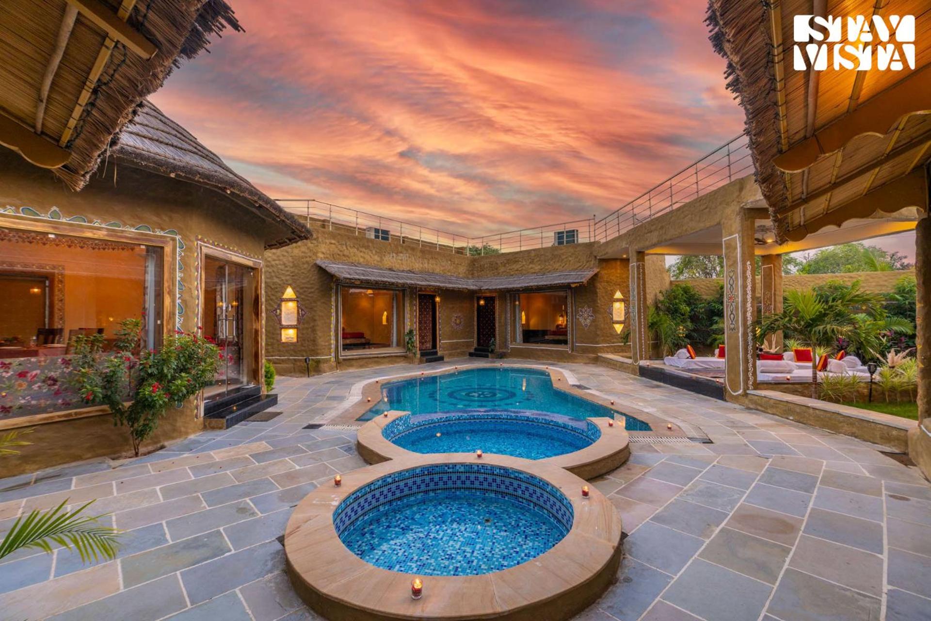 StayVista's Majestic Mud House - Rajasthani Architecture with Modern Amenities, Outdoor Pool, Adventure Activities, and Spa view 2