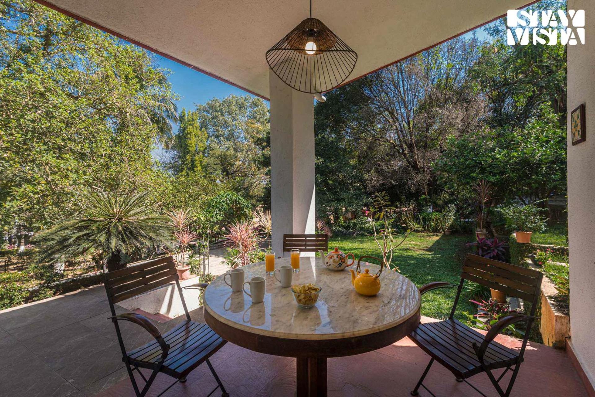 StayVista's Kia Ora - Amidst Greenery Villa with Outdoor Pool, Balconies, and Indoor Games view 2