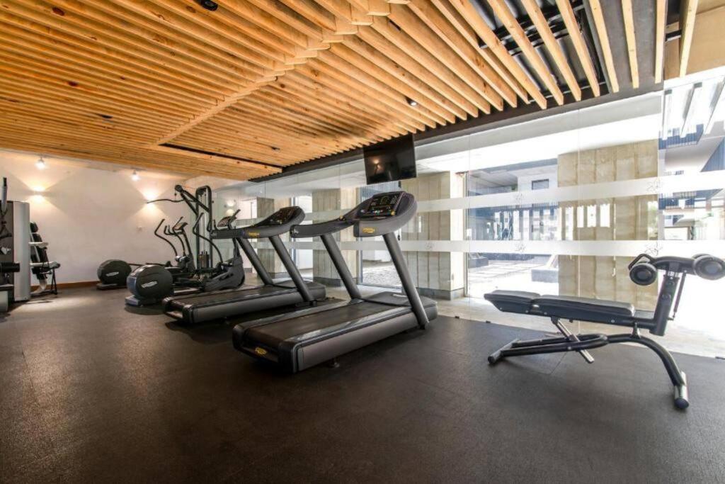 Modern Luxe 2bd w/pool/gym/steam view 2