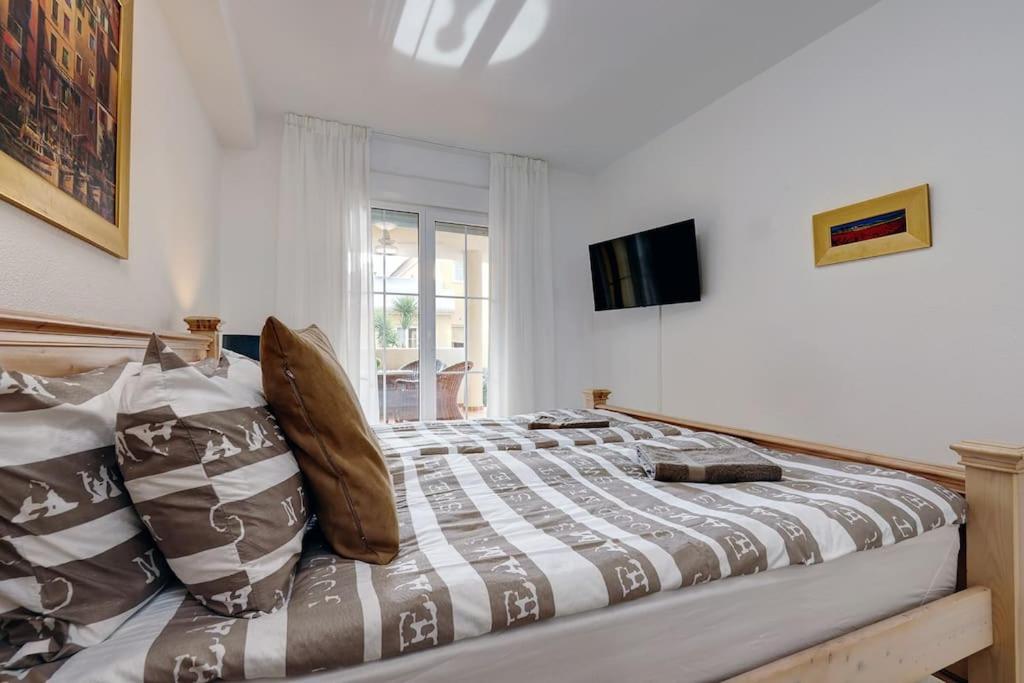 South facing apartment near sandy beach and golf courses