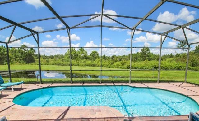 Serene 4-Bedroom Lakeview Retreat with South-Facing Pool & Sun-Drenched Outdoor Living