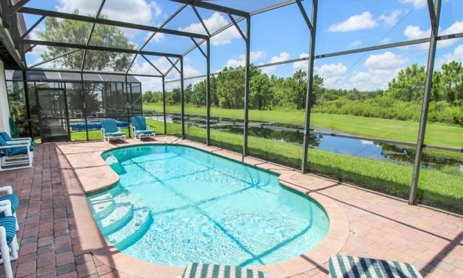 Serene 4-Bedroom Lakeview Retreat with South-Facing Pool & Sun-Drenched Outdoor Living