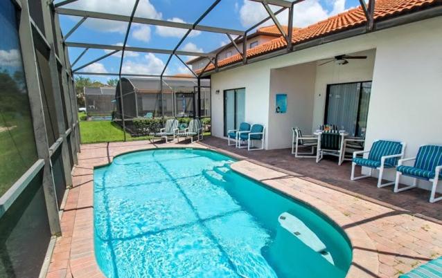 Serene 4-Bedroom Lakeview Retreat with South-Facing Pool & Sun-Drenched Outdoor Living