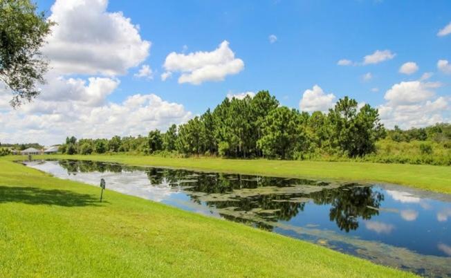 Serene 4-Bedroom Lakeview Retreat with South-Facing Pool & Sun-Drenched Outdoor Living