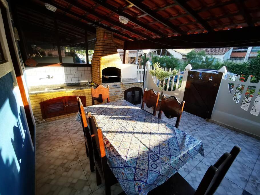 Casa Azul na Praia do Verão Vermelho