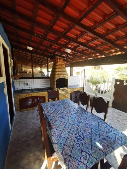 Casa Azul na Praia do Verão Vermelho