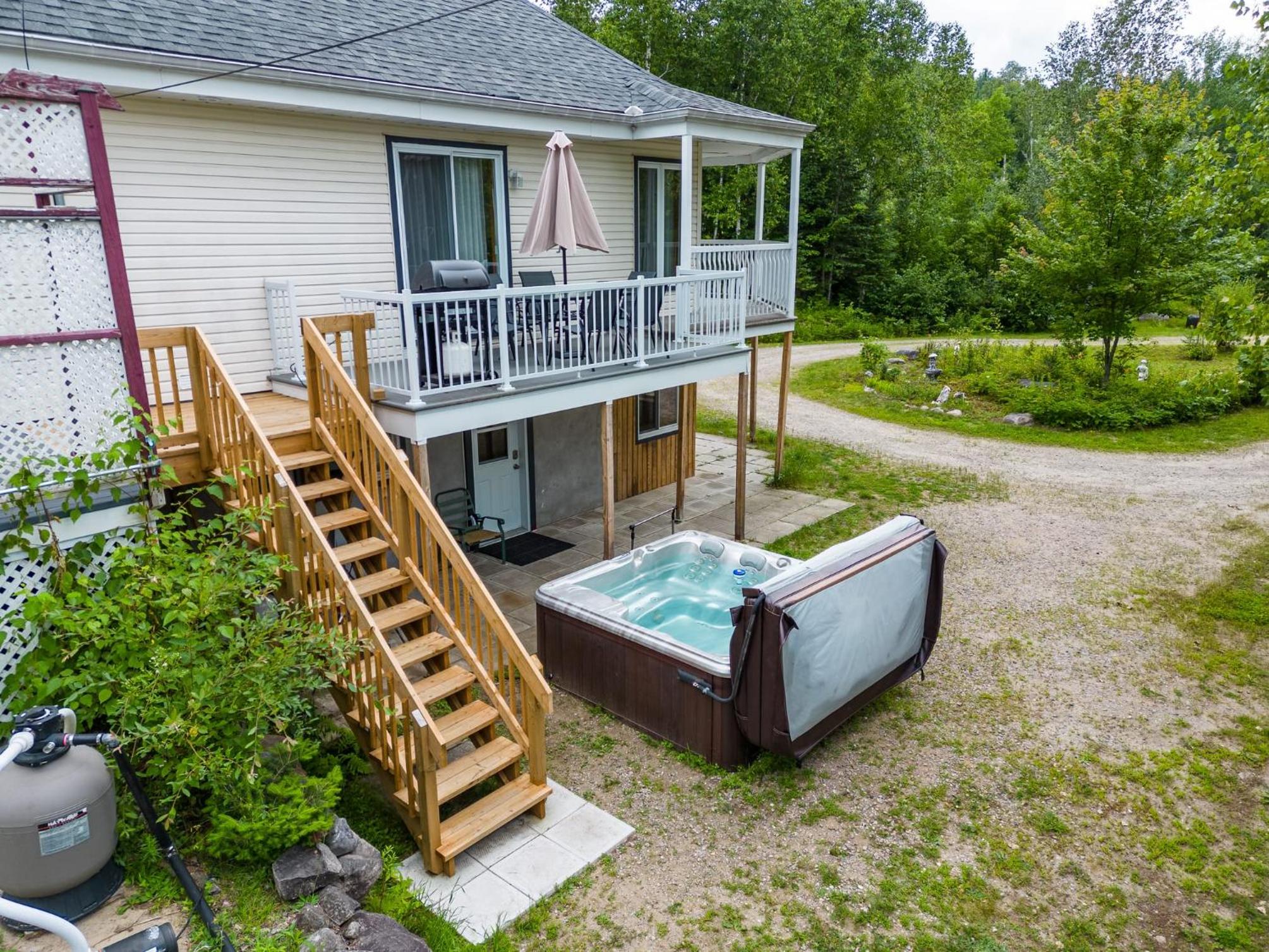 Spacious cottage in forest with spa