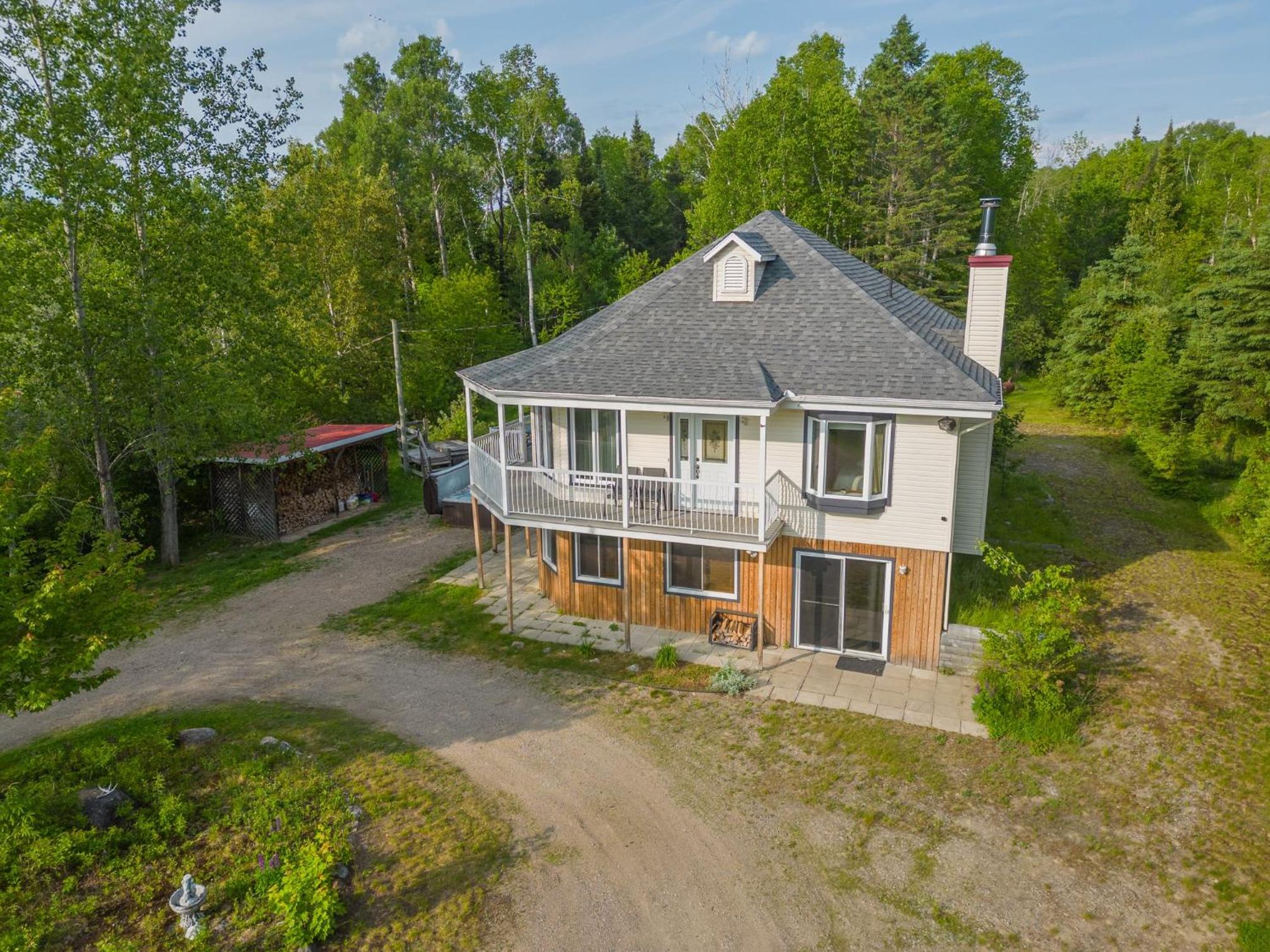 Spacious cottage in forest with spa