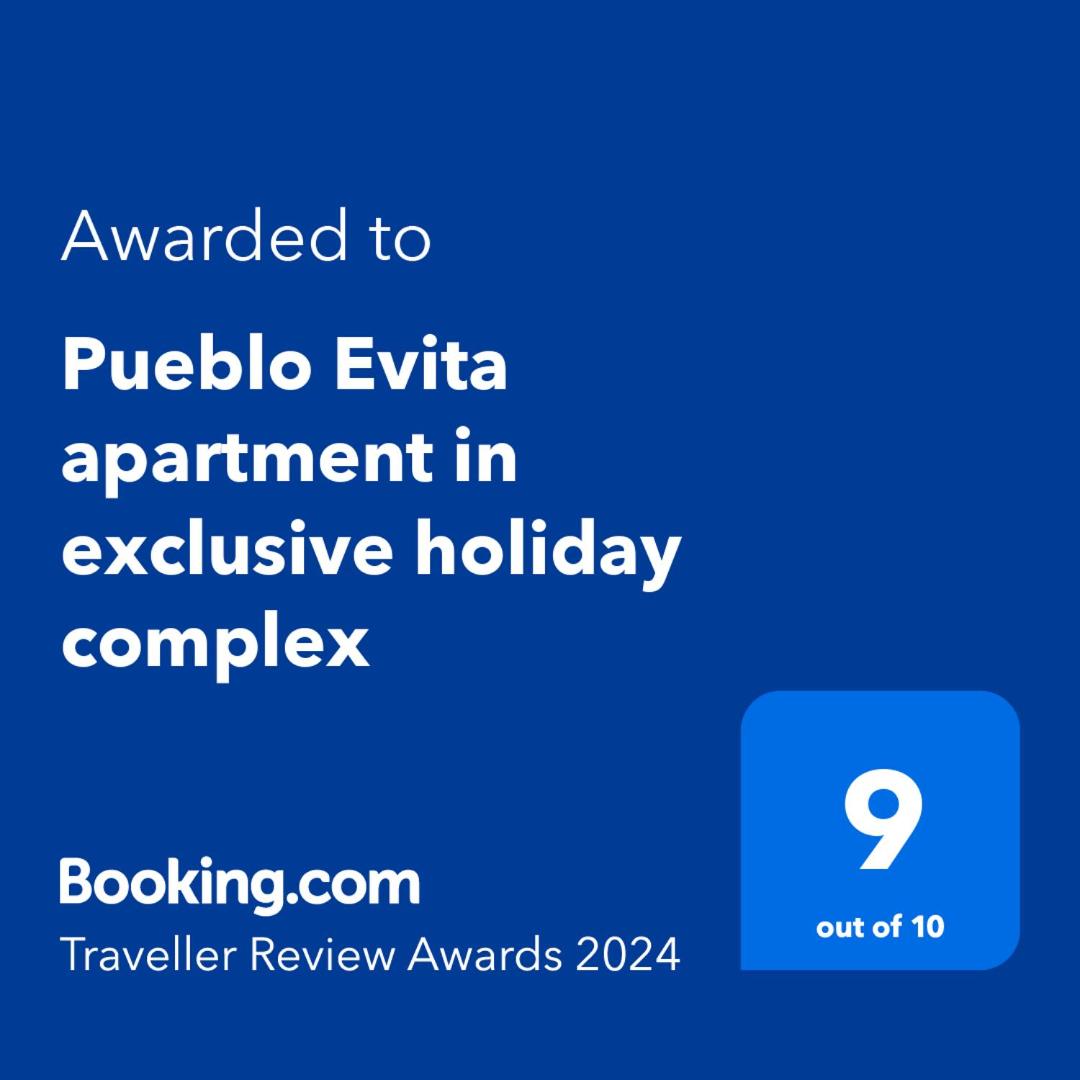 Andalusian style apartment in Pueblo Evita exclusive holiday complex