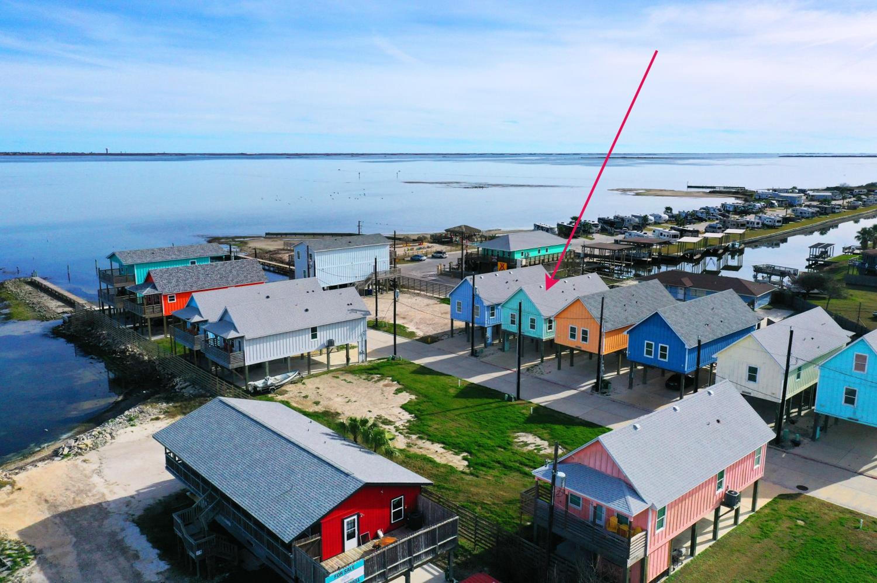 Balcony w Bay View Shared Pool Boat Dock Fat Flounder by AvantStay