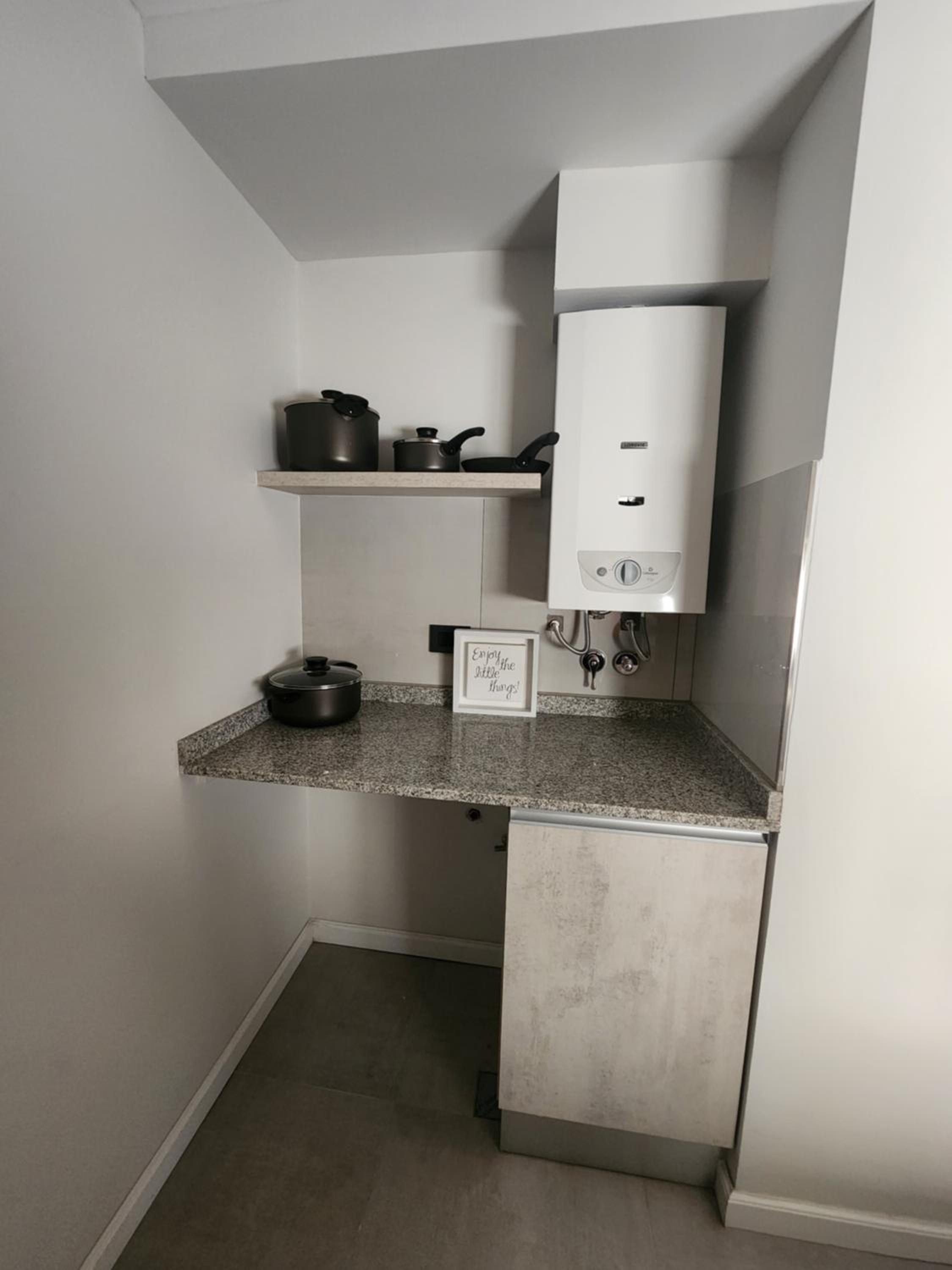 DEPARTAMENTO 1 DOR CENTRICO CON COCHERA Y PARRILLA