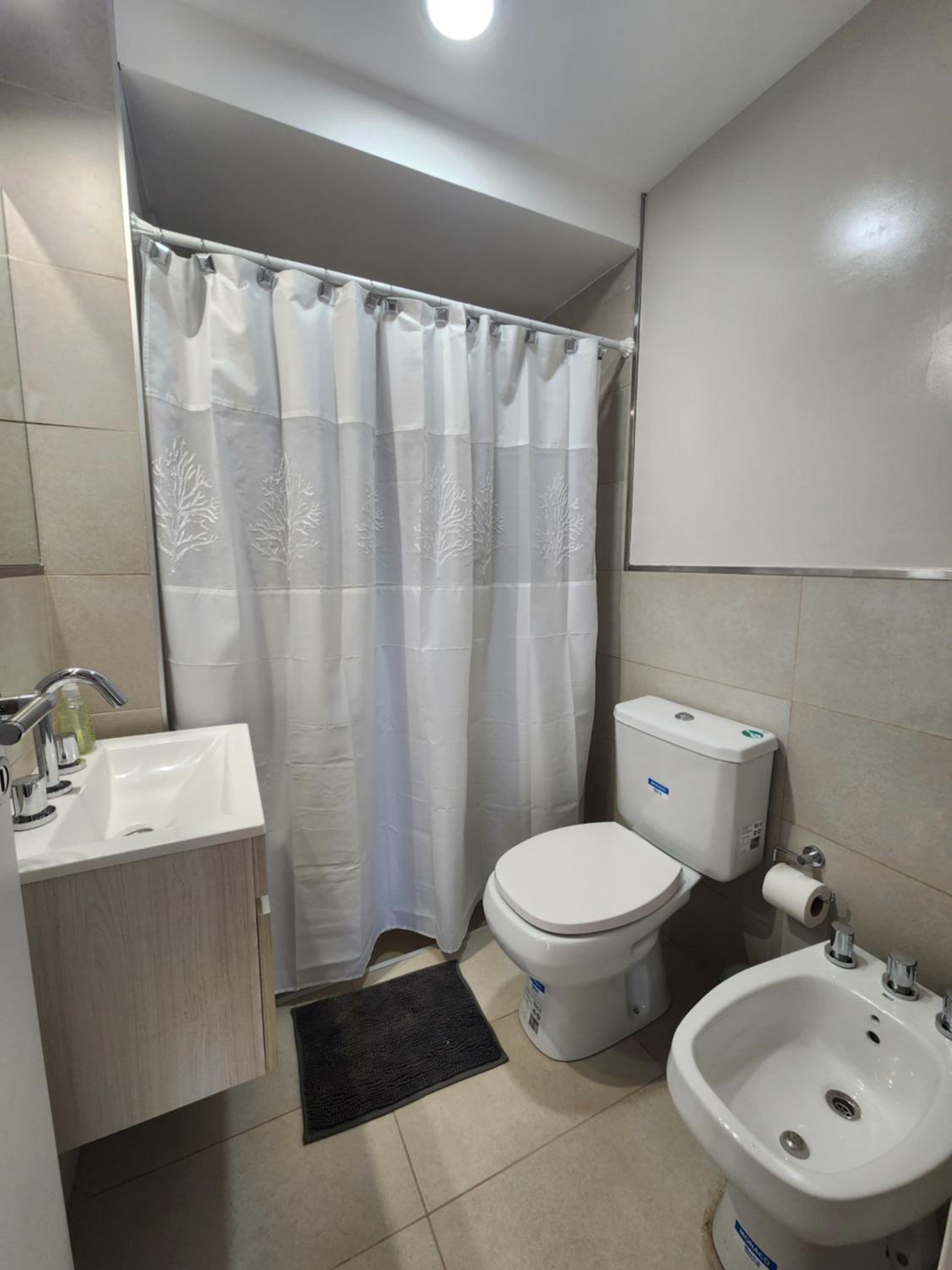 DEPARTAMENTO 1 DOR CENTRICO CON COCHERA Y PARRILLA