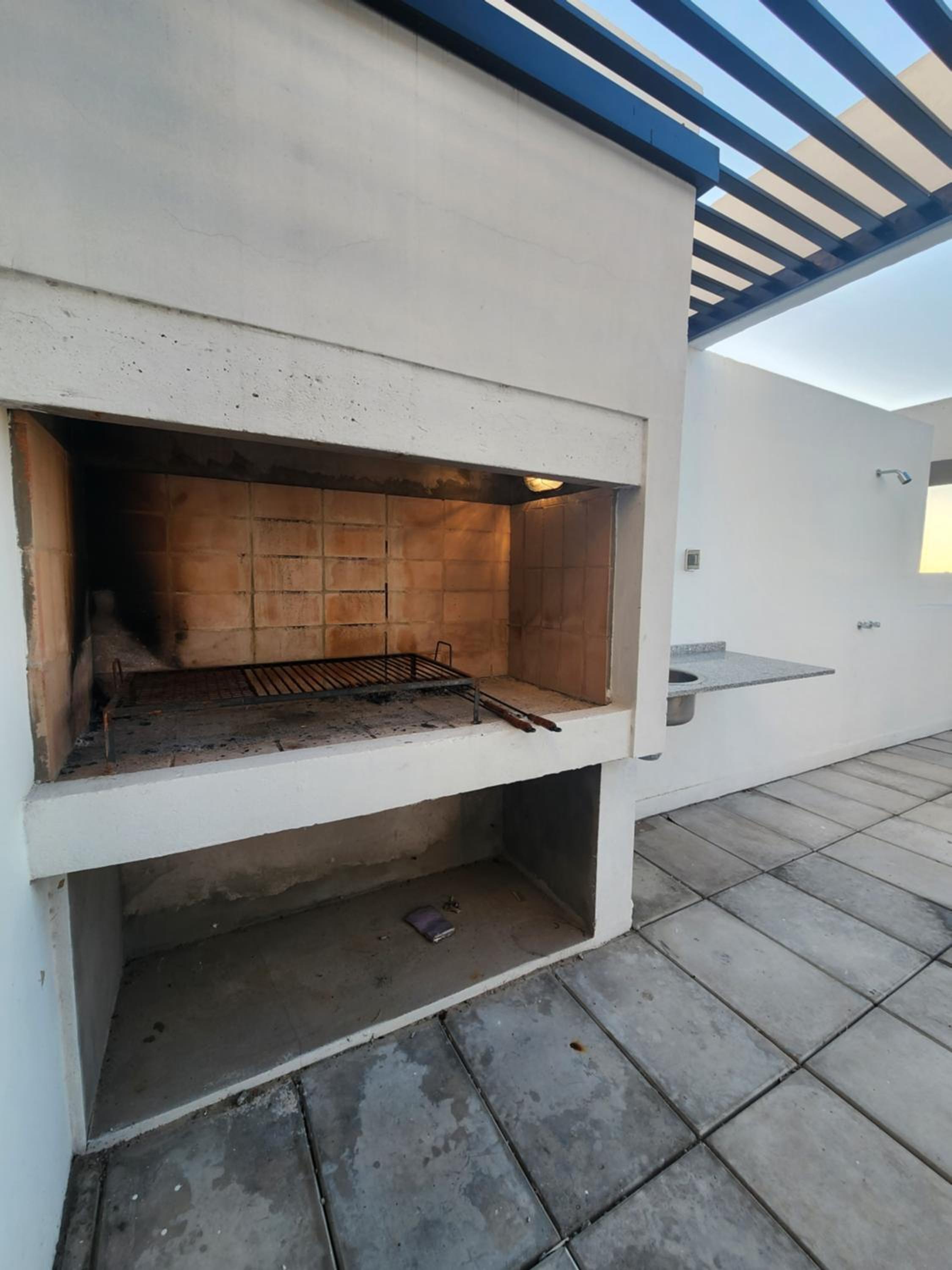 DEPARTAMENTO 1 DOR CENTRICO CON COCHERA Y PARRILLA