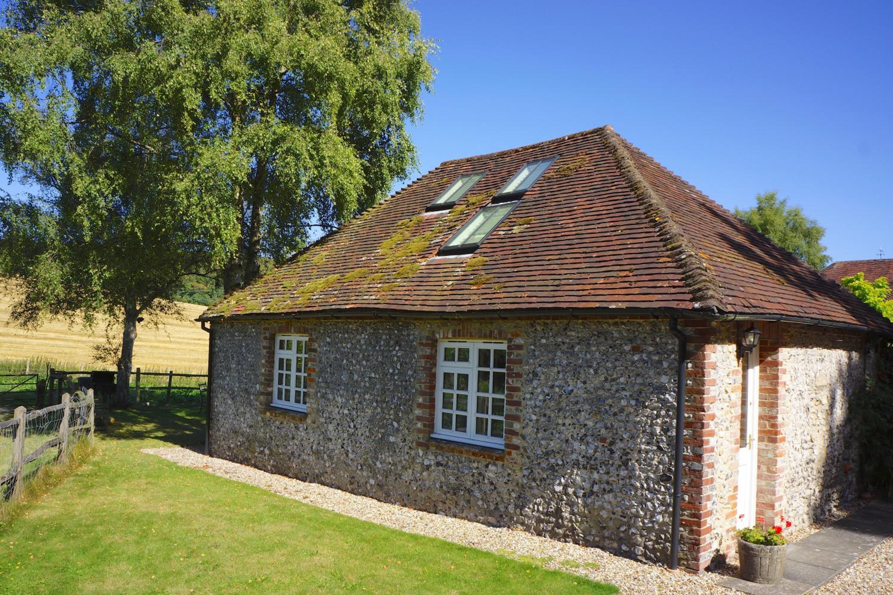 Luxury barn with tennis court in South Downs National Park