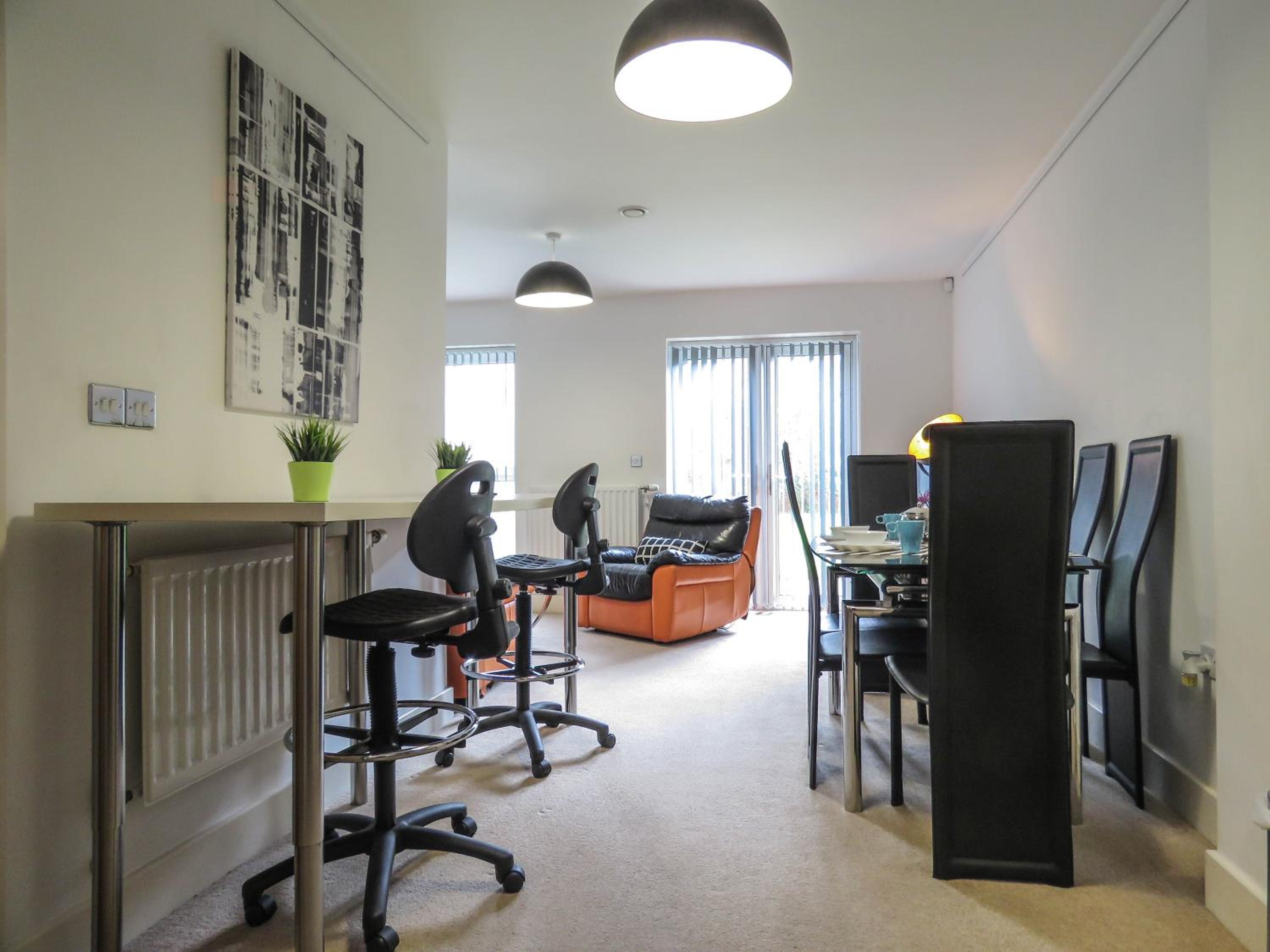 Tudors eSuites Private Garden and Netflix view 3
