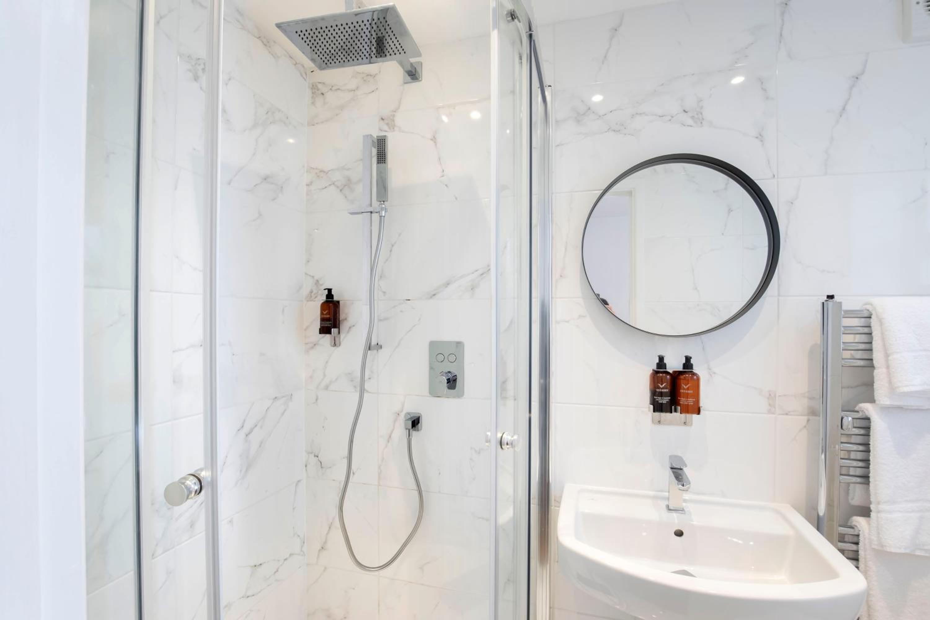 Luxurious 1 Bed Detached Home with Gated Parking view 5