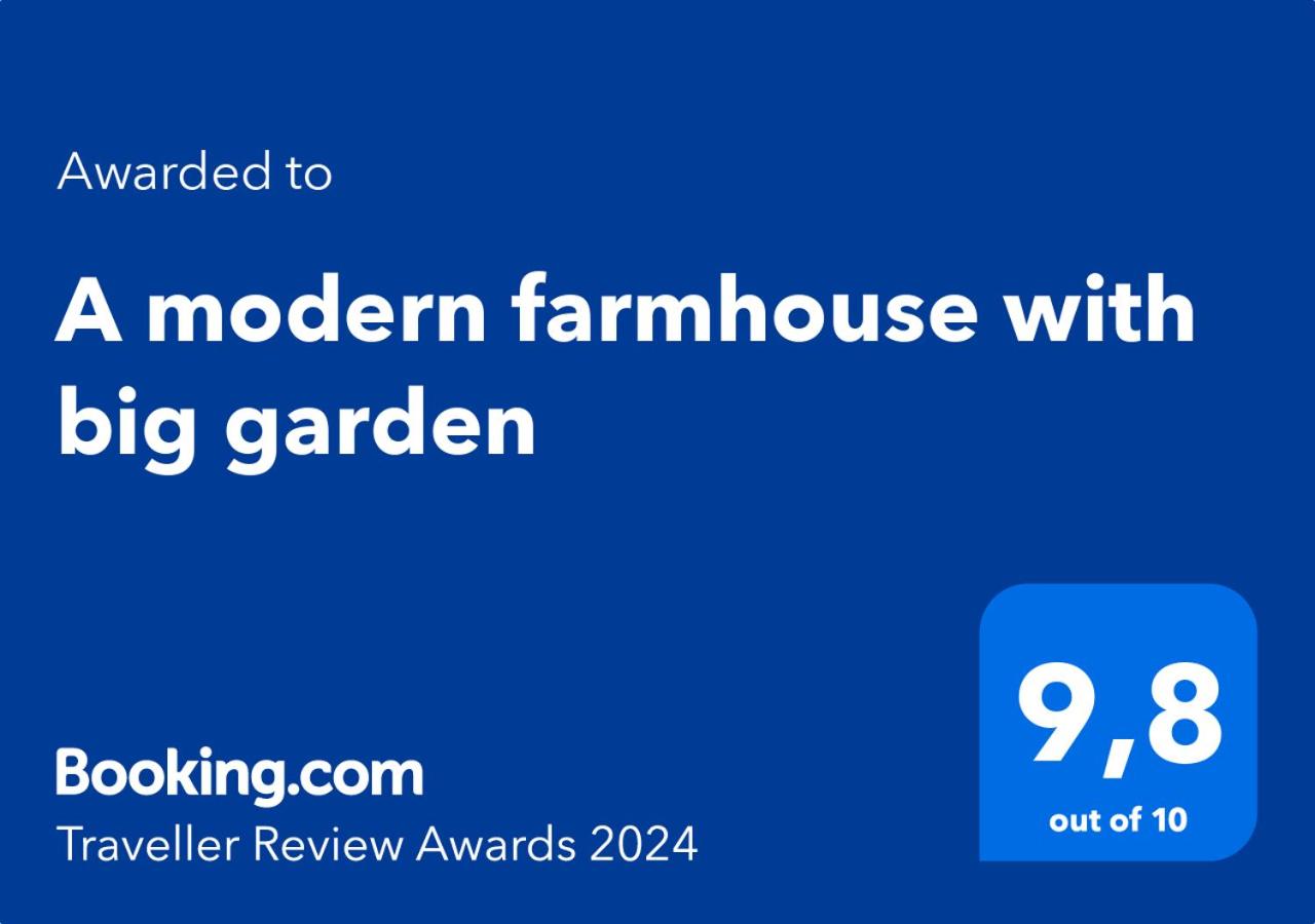 A modern farmhouse with big garden view 2