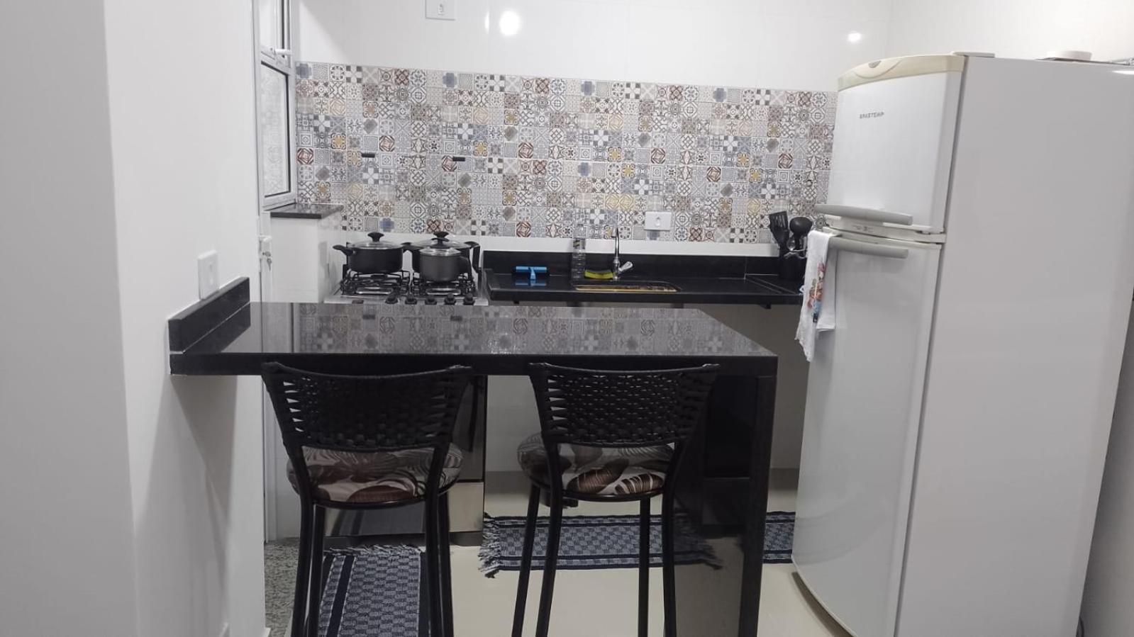 CASA 7 ENSEADA 2 Suíte E ESTACIONAMENTO GRÁTIS e uma ótima localização na enseada