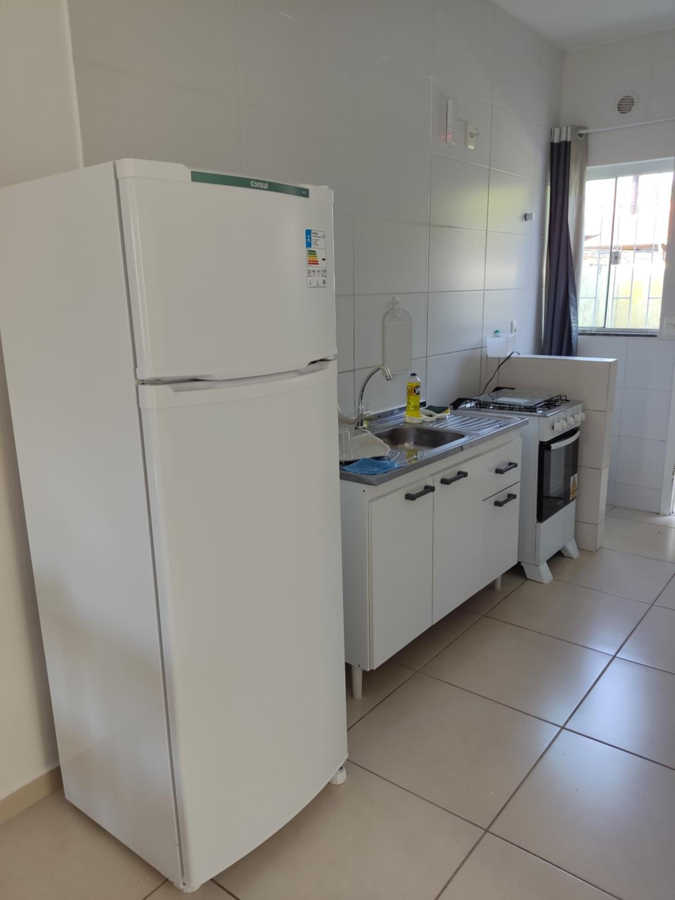 EM CASA