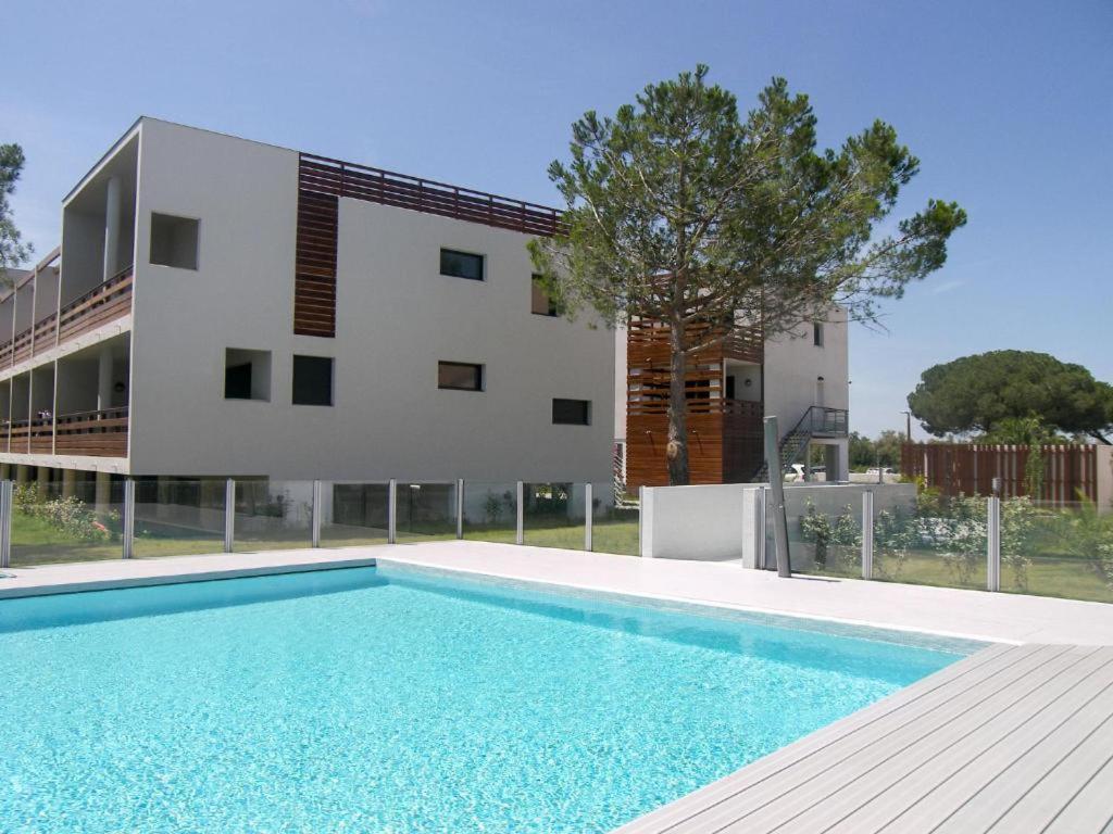 VERT PARADIS - Appartement 3 étoiles, Vue apaisante sur GOLF, Pins Parasols, 2è étage - 80 m2 dont Terrasse avec Pergola, 2 chambres, 3 CLIM, WIFI - Piscin