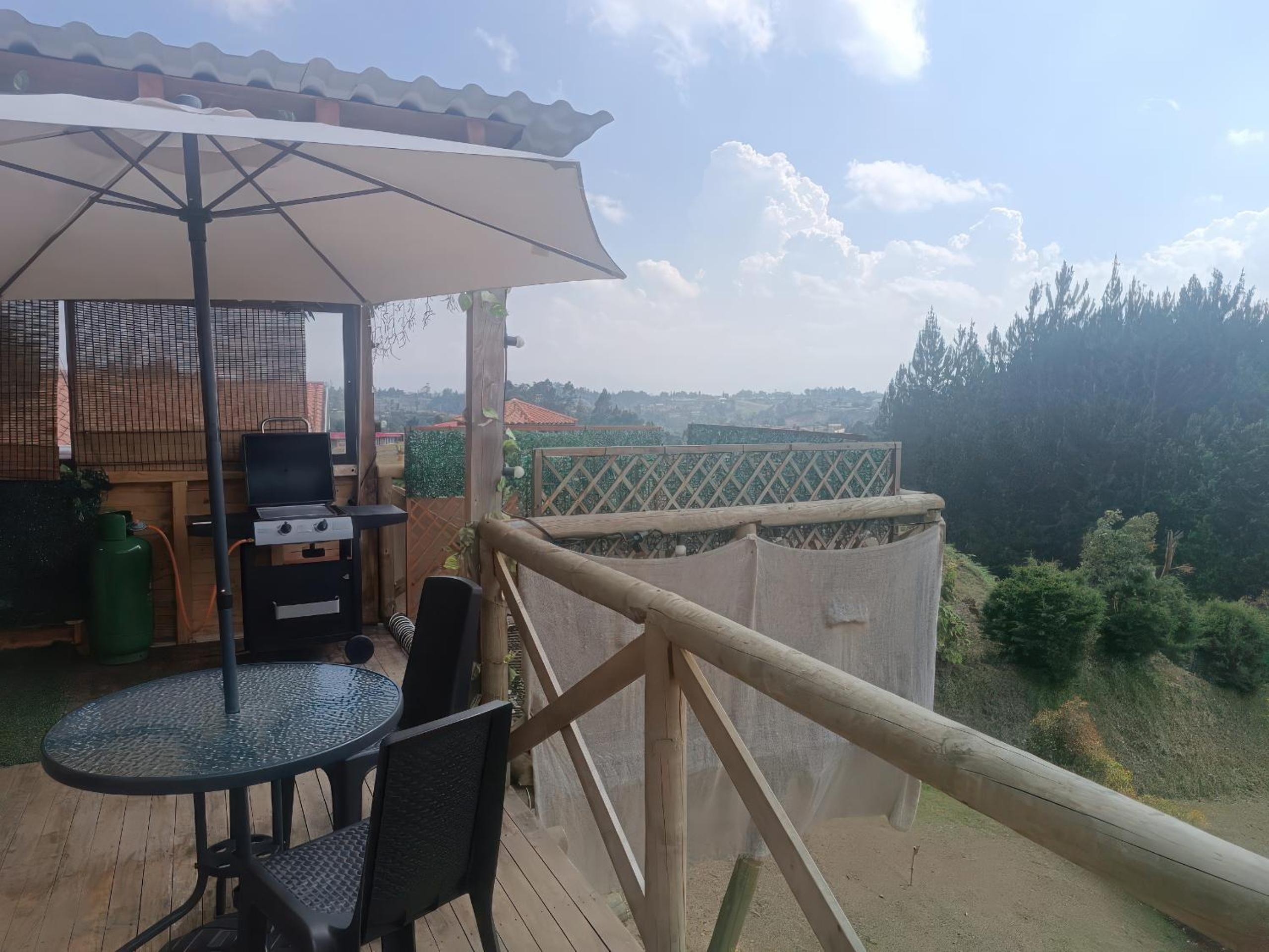 Cabaña con Jacuzzi/Zona BBQ y Malla catamarán en Guarne
