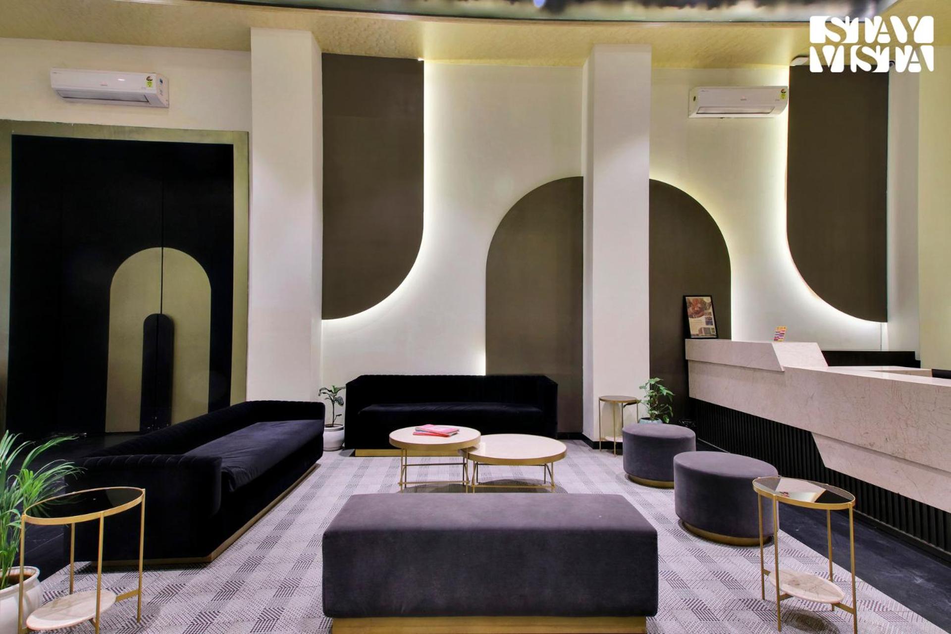 StayVista's Skyline Studio Apartments - Urban Oasis with Terrace, Gym & Bar