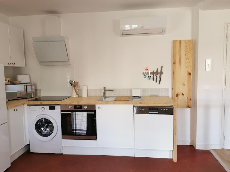 Soleil poudré appartement 1 chambre, pièce de vie climatisée, parking, terrasse