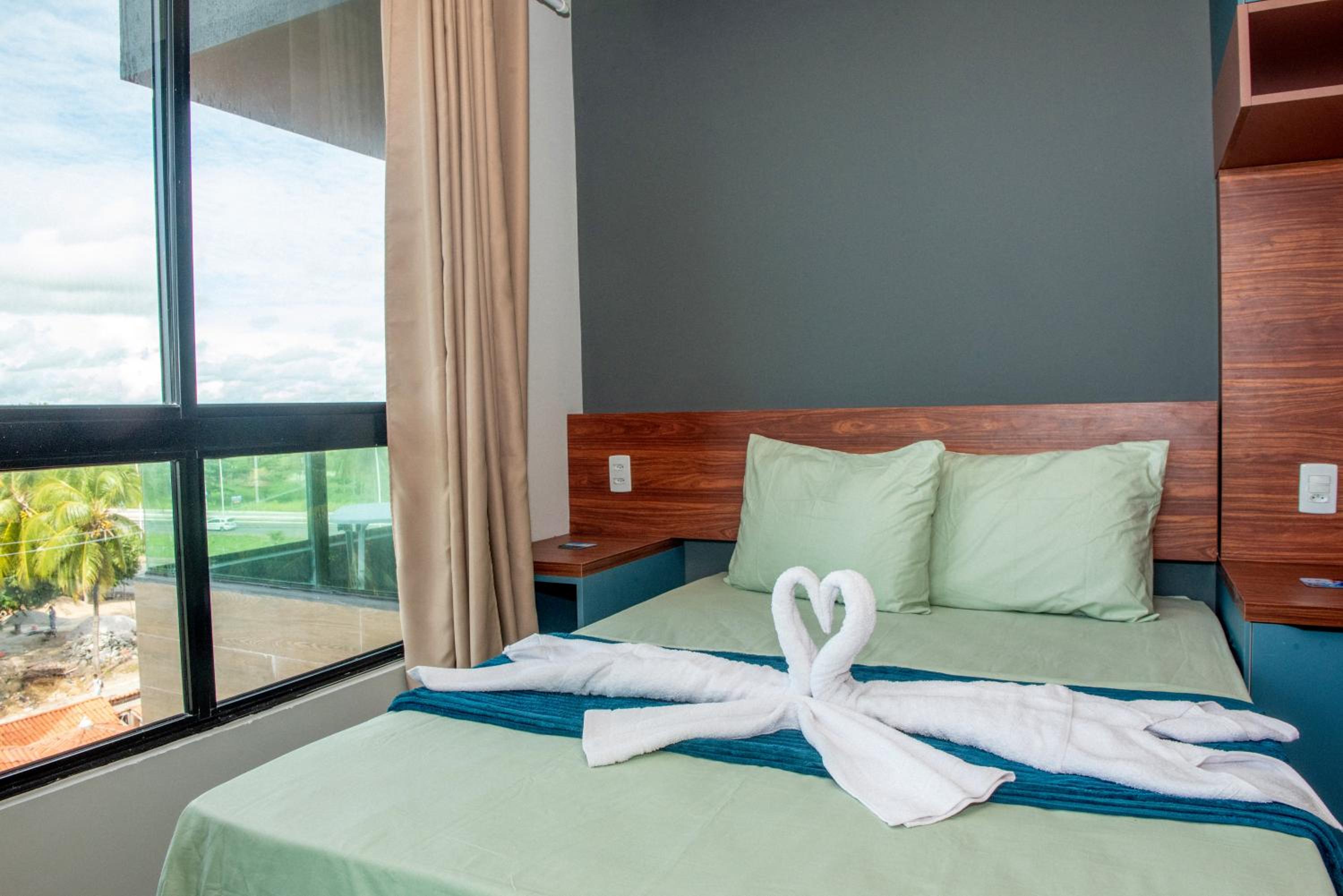 Apto a 150m da praia, Rooftop com piscina & sauna em Porto de Galinhas
