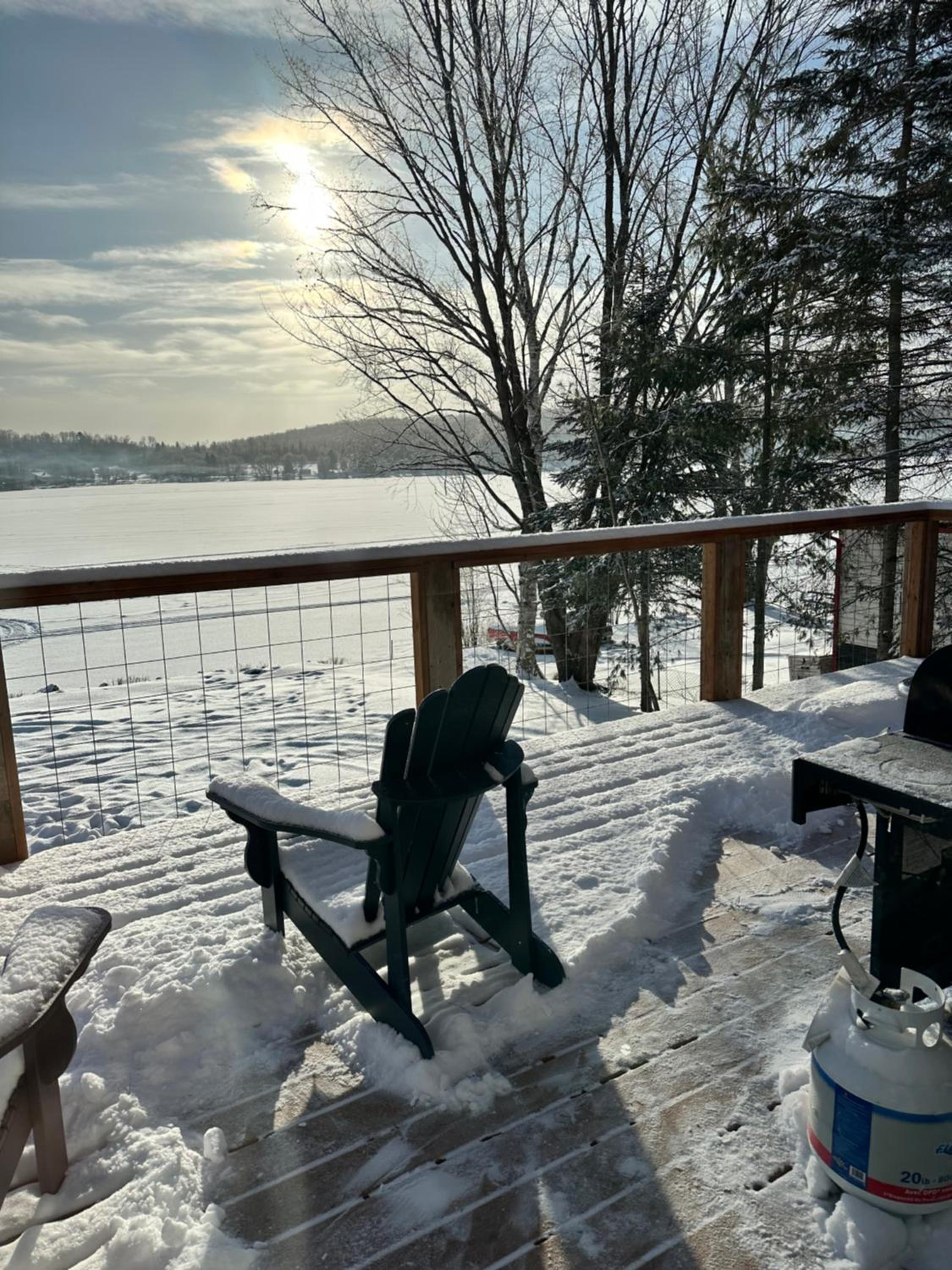 New build, luxurious, 4 plus bedrooms, 2 and a half baths, waterfront chalet, SNOWMOBILE trail access, ample parking & ICE FISHING SHACK