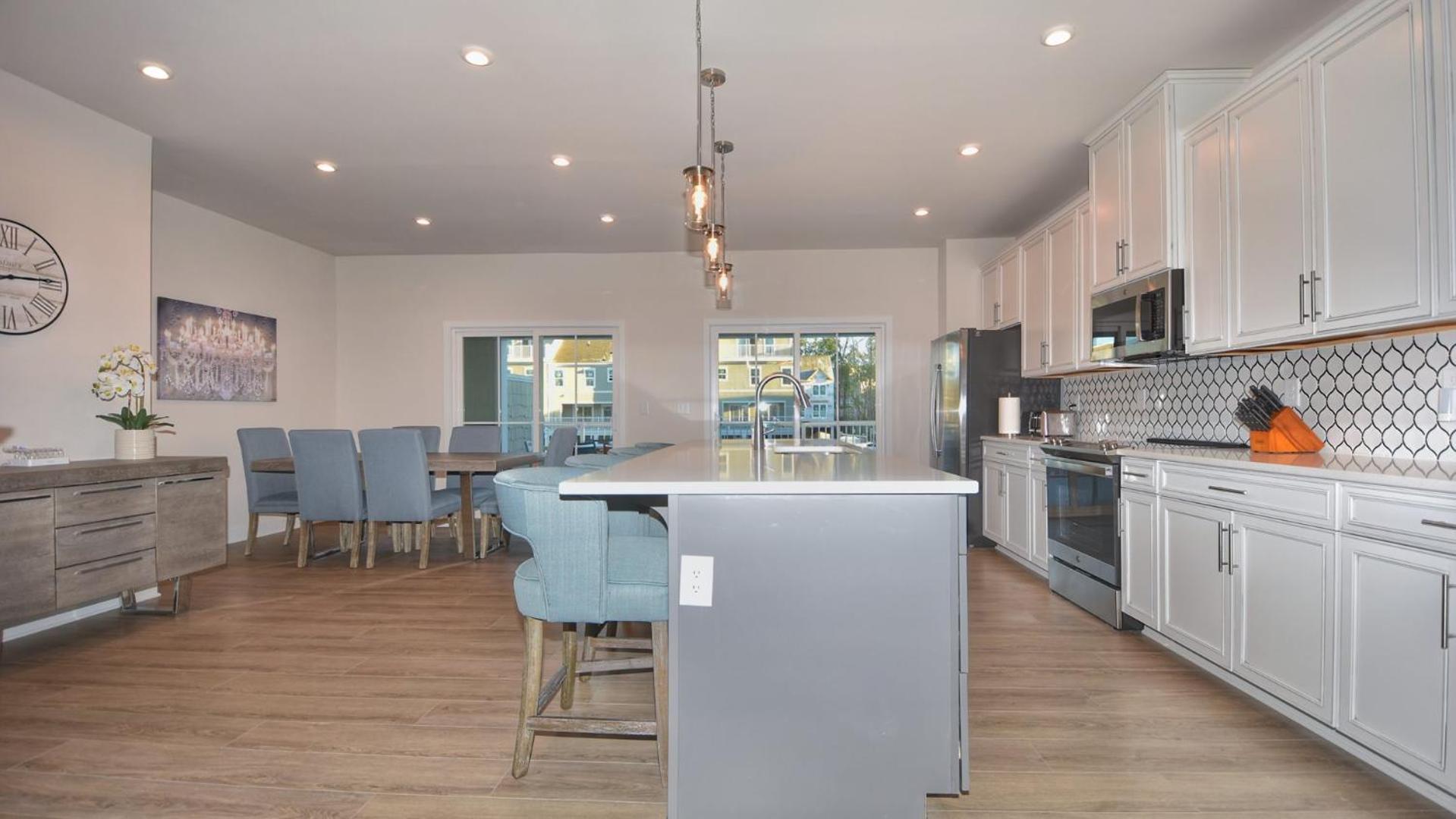 Newly built open-concept and beautifully decorated 4 Bedroom in Barefoot Resort 802 Dye Townhome view 3