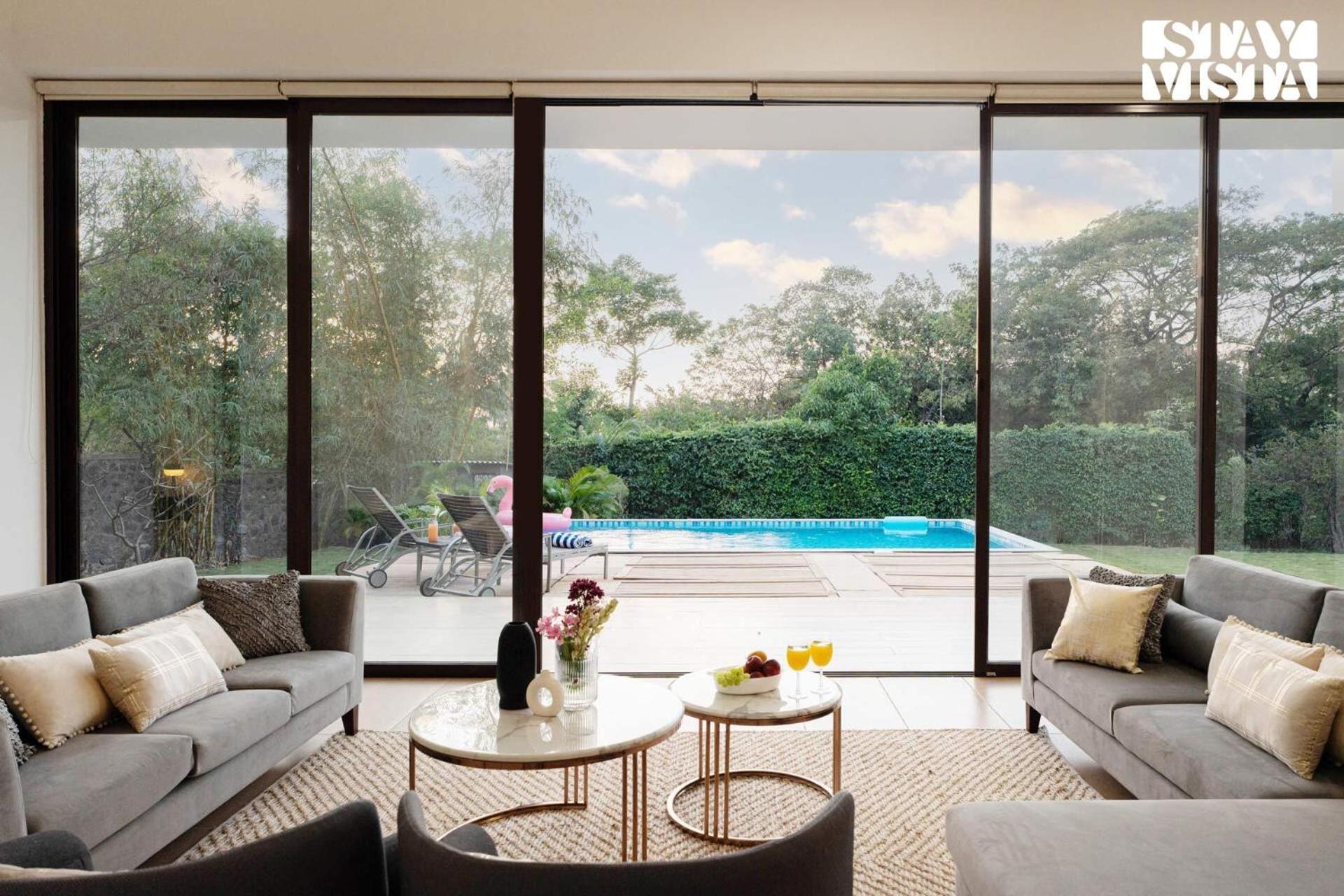 Wildflower Villa by StayVista - Poolside retreat with contemporary interiors & indoor activities view 4